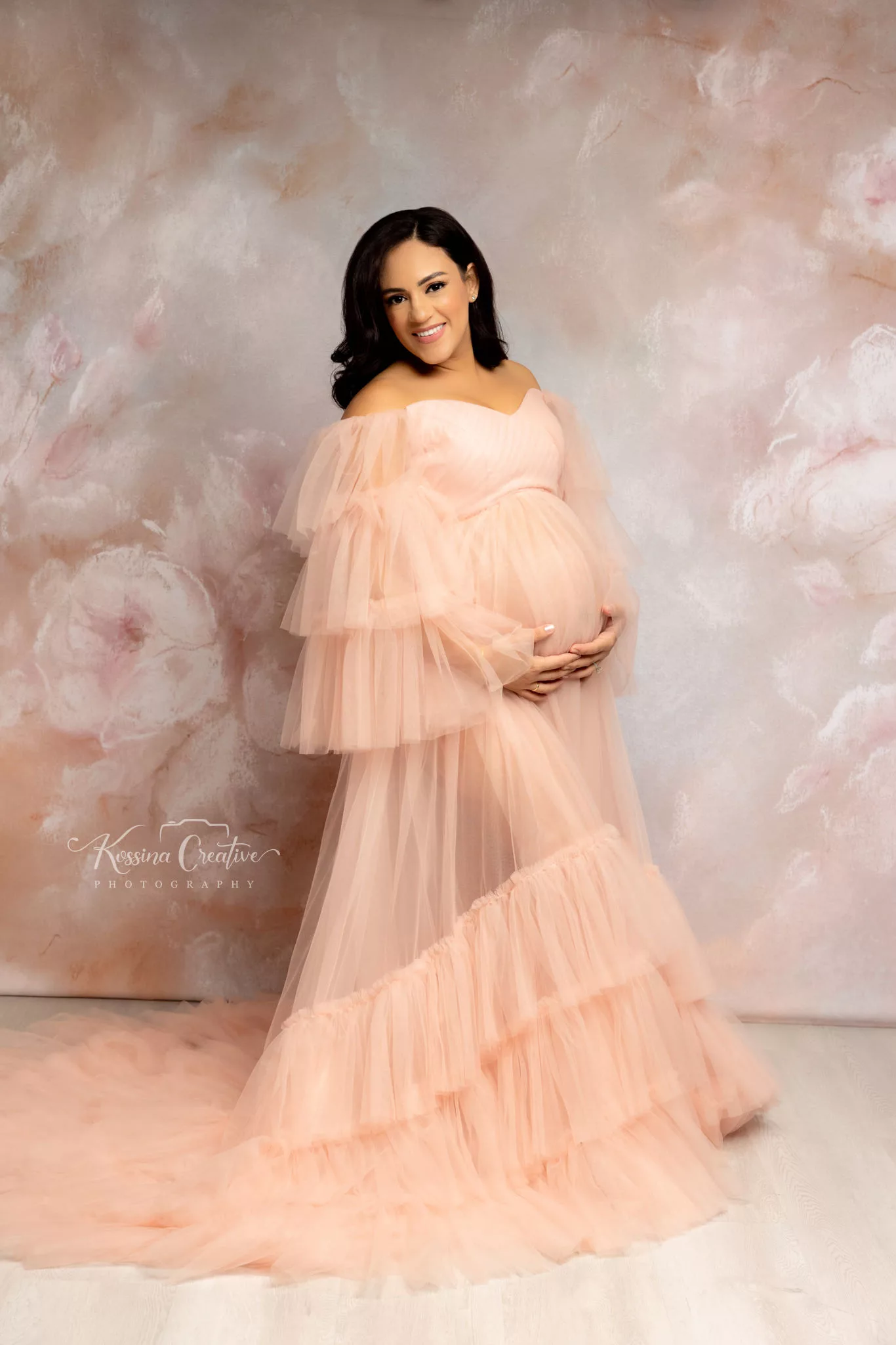 Orlando Maternity Photographer Photo Studio peach gown with floral background