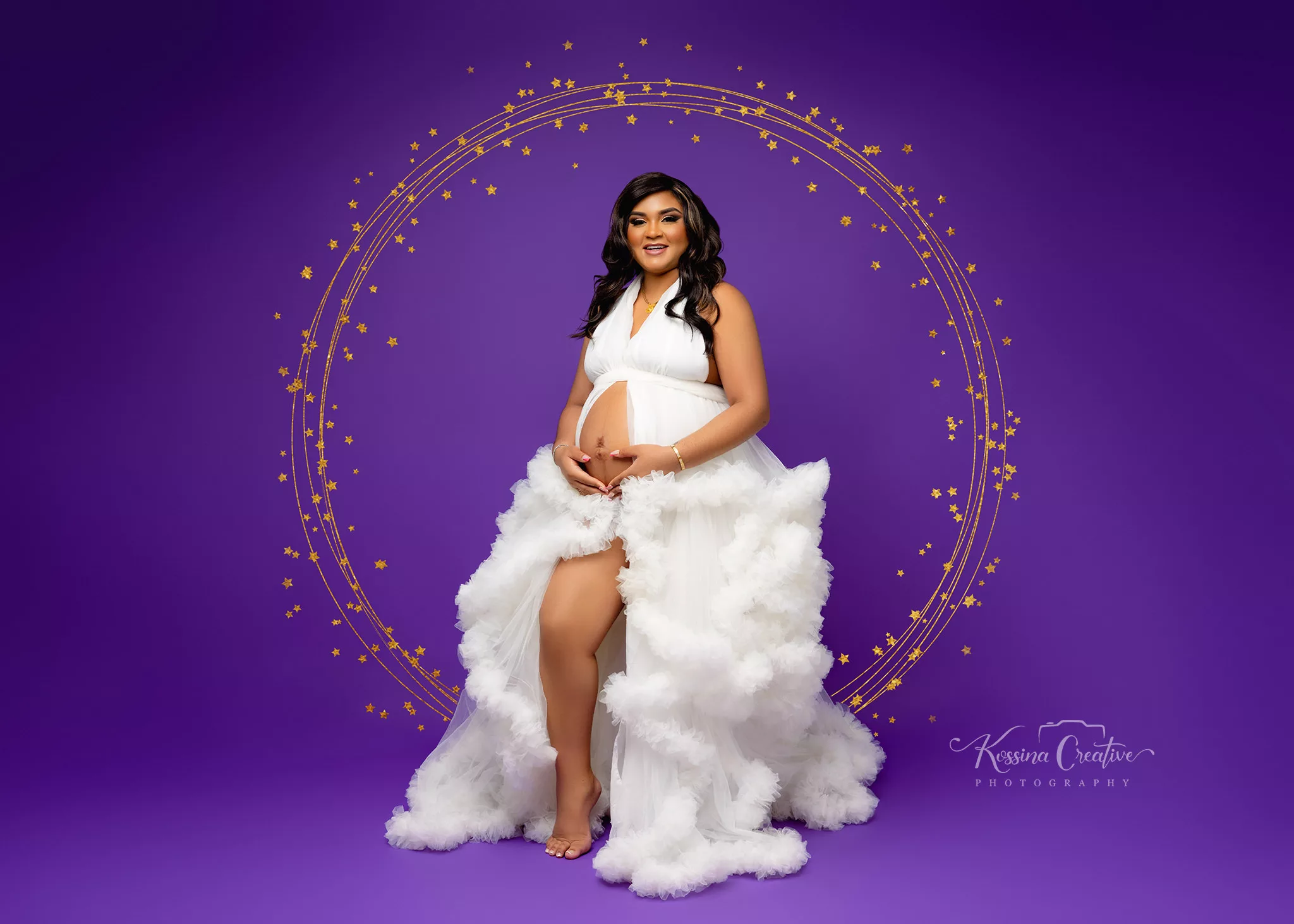 Orlando Maternity Photographer Photo Studio white gown gold rings with purple background