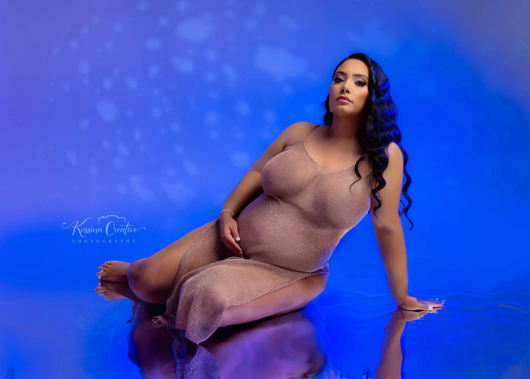 Orlando Maternity Photographer Photo Studio maternity boudoir with blue background