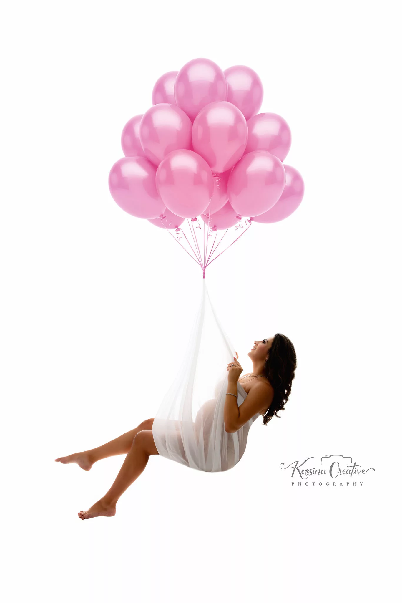 Orlando Maternity Photographer Photo Studio hanging pink balloon maternity