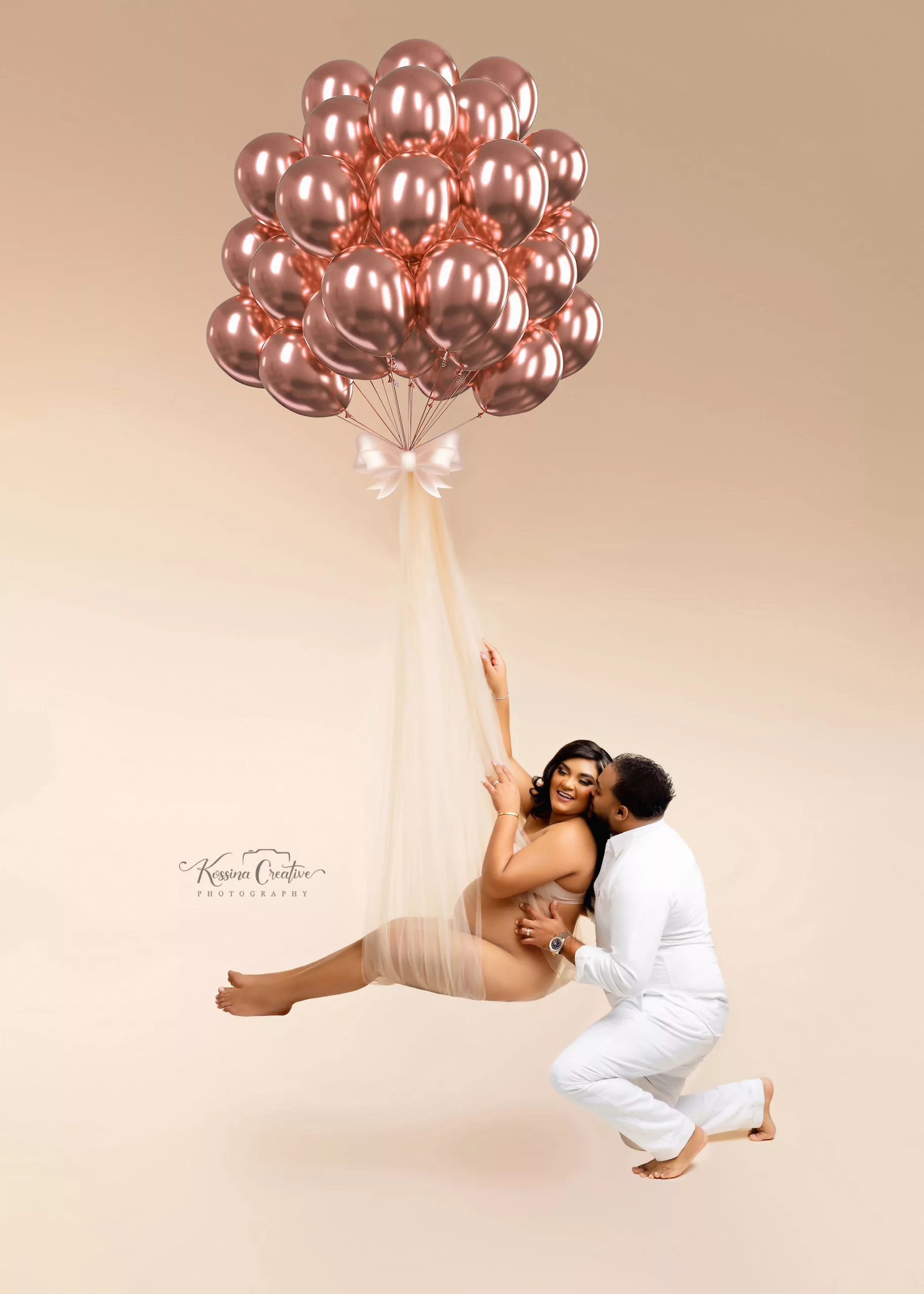 Orlando Maternity Photographer Photo Studio rose gold balloon hanging maternity