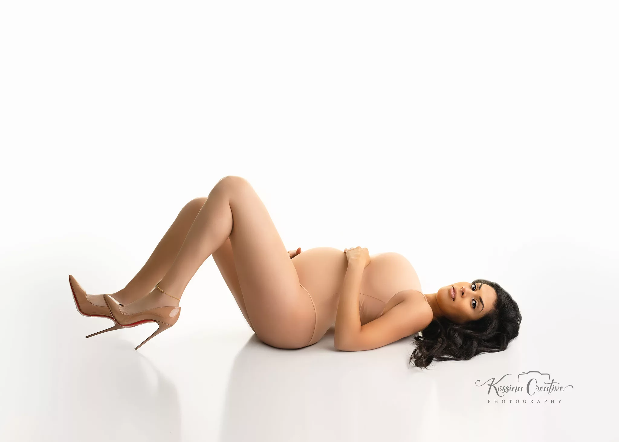 Orlando Maternity Photographer Photo Studio laying down