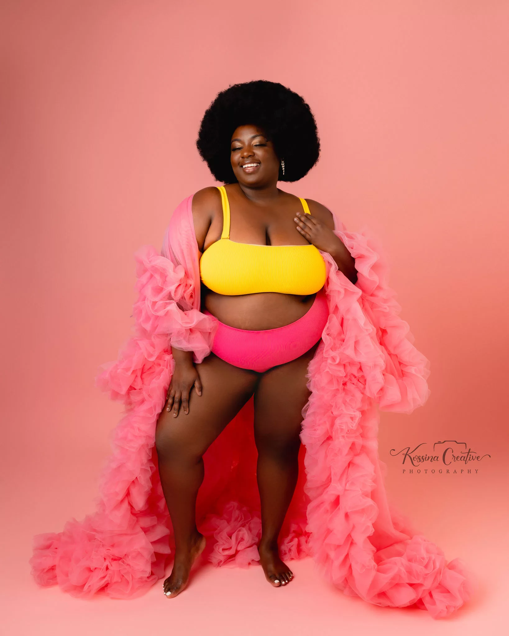 Orlando Boudoir Photographer Photo Studio Glamour shots yellow top pink bottoms