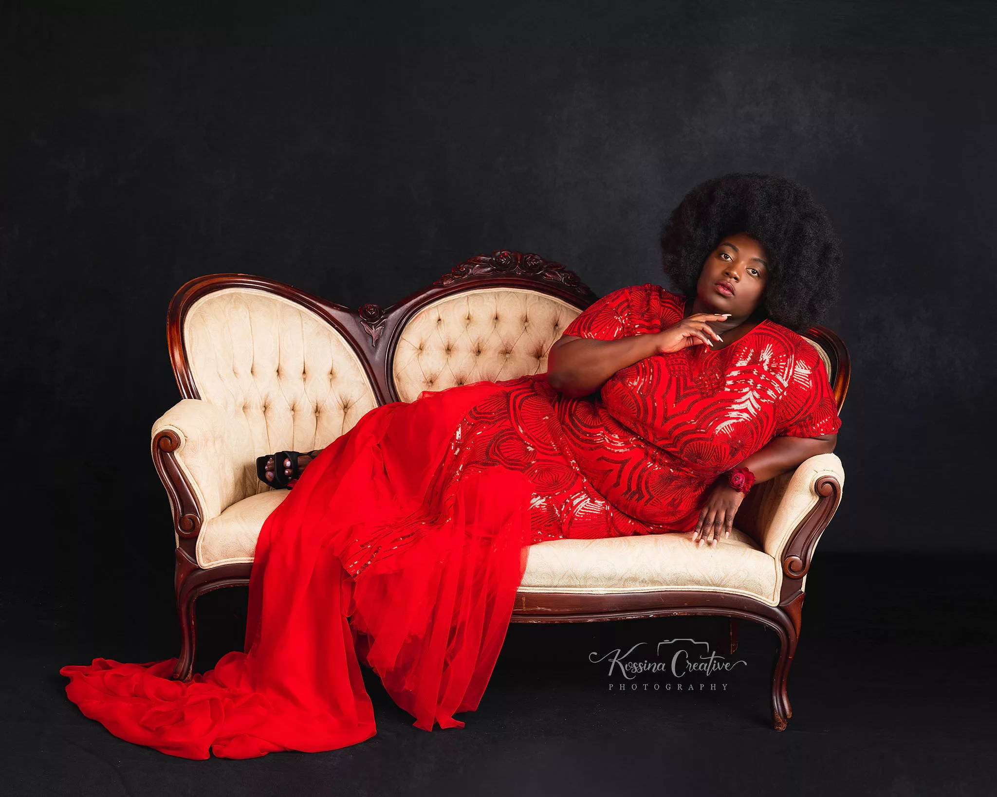 Orlando Boudoir Photographer Photo Studio Glamour shots red dress on couch