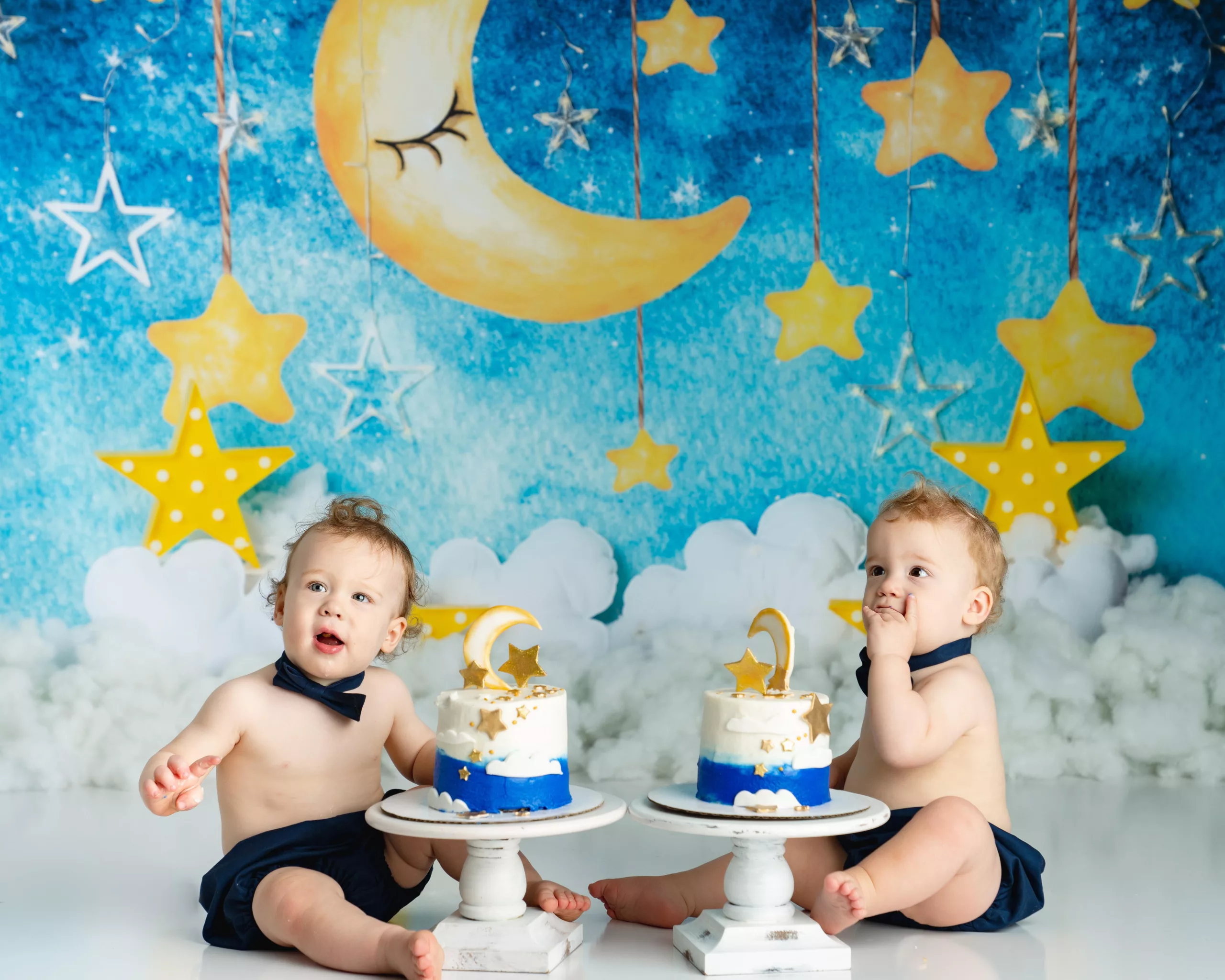Orlando Boy Cake Smash 1st Birthday Photographer Photo Studio lullaby background sleeping moon with star sand clouds twin cake smash night night theme bowties