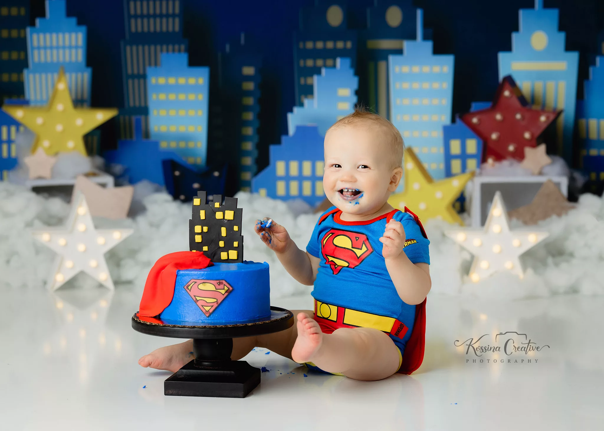 Orlando Boy Cake Smash 1st Birthday Photographer Photo Studio dc superheros superman cake superhero city background