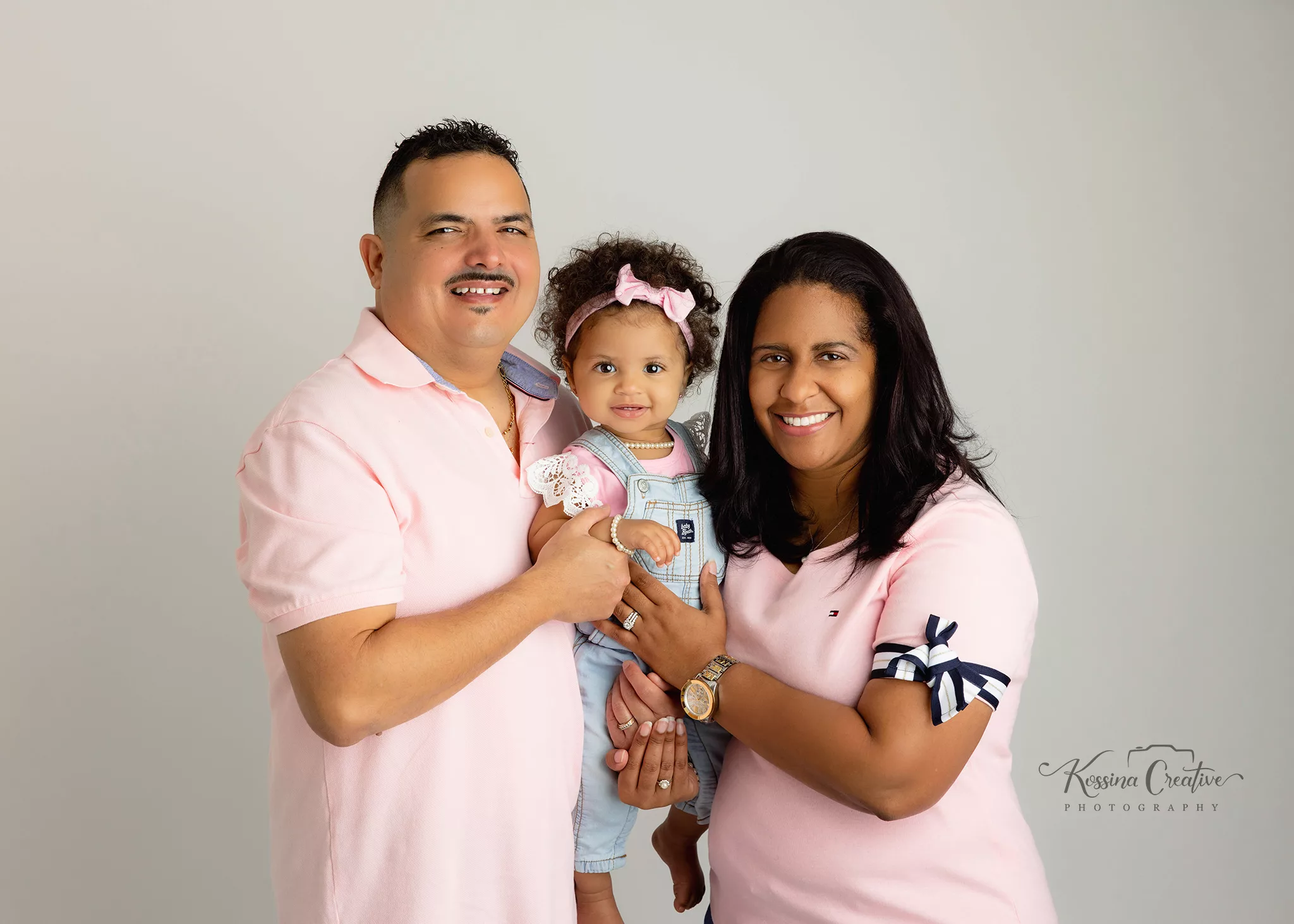 Orlando Family Cake Smash 1st Birthday Photographer Photo Studio family of three light pink overalls white