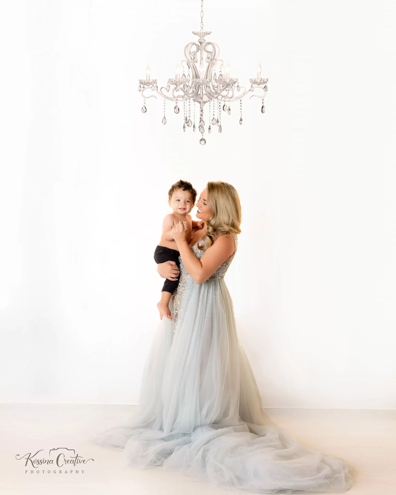 Orlando Family Cake Smash 1st Birthday Photographer Photo Studio chandelier mommy and me silver dress elegant