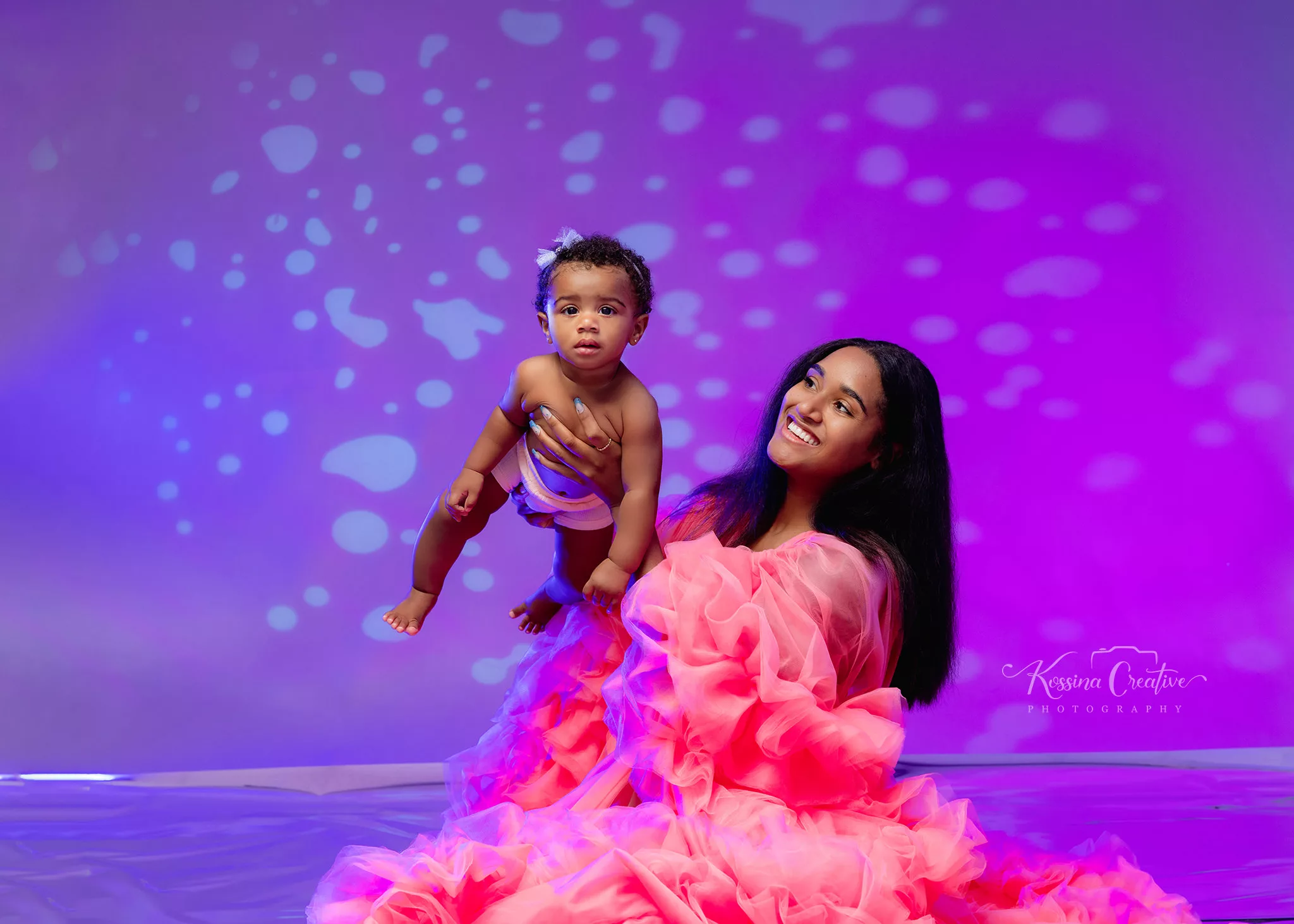 Orlando Family Cake Smash 1st Birthday Photographer Photo Studio purple hot pink mommy and we fluffy dress