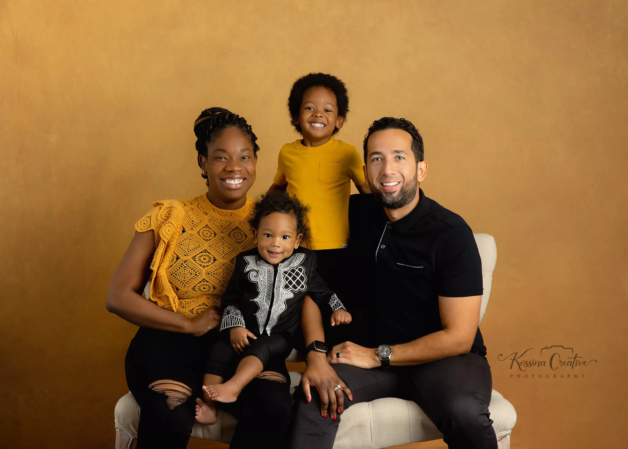 Orlando Family Cake Smash 1st Birthday Photographer Photo Studio deep yellow background family of four on couch