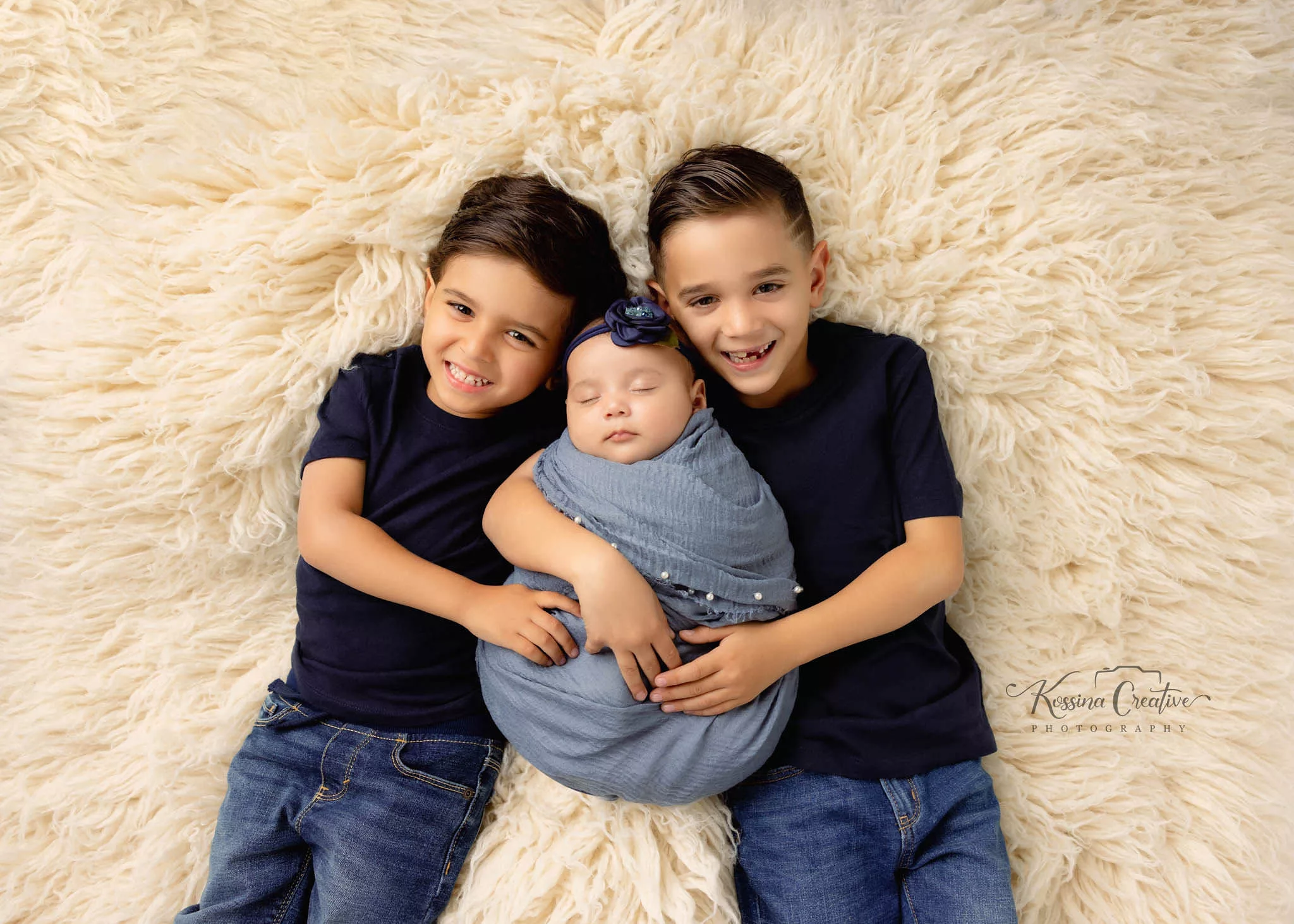 Orlando Family Newborn Photographer Baby Kid Photo studio siblings brothers with baby sister blue with cream background