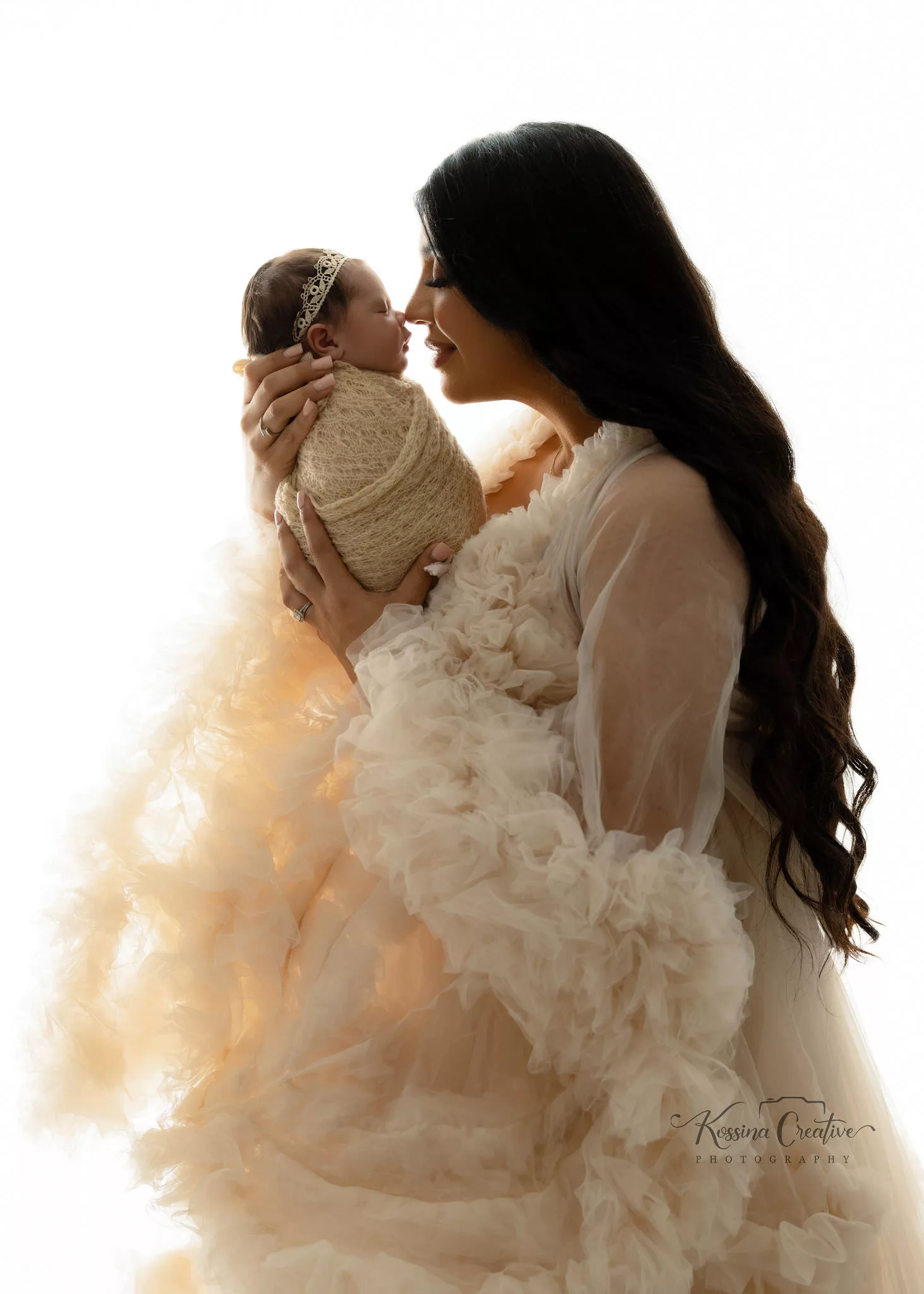 Orlando Family Newborn Photographer Baby Kid Photo studio silhouette nose to nose poofy cream dress mom and baby snuggle