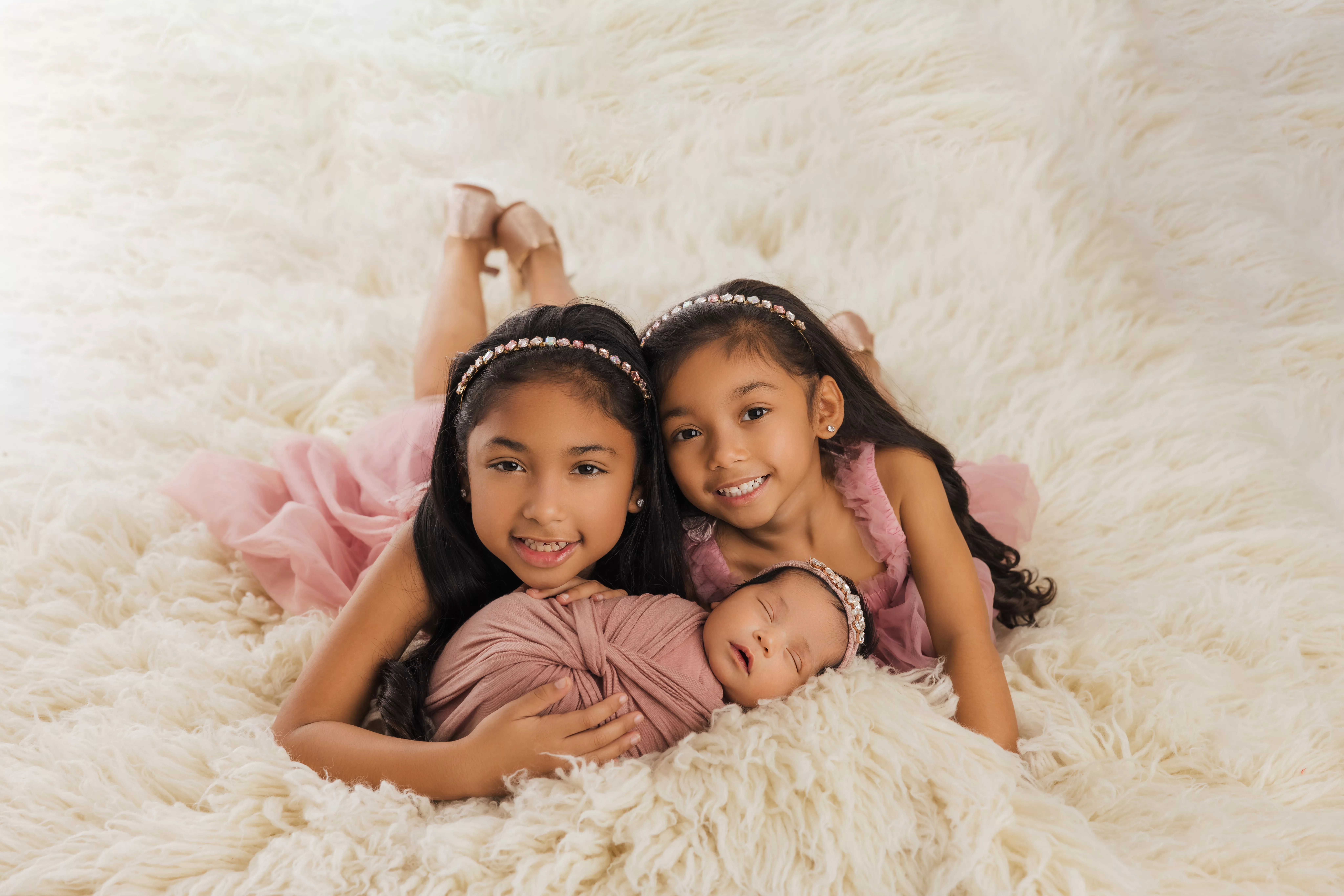 Orlando Family Newborn Photographer Baby Kid Photo studio sisters siblings big sisters cream fluff pastel pink dresses