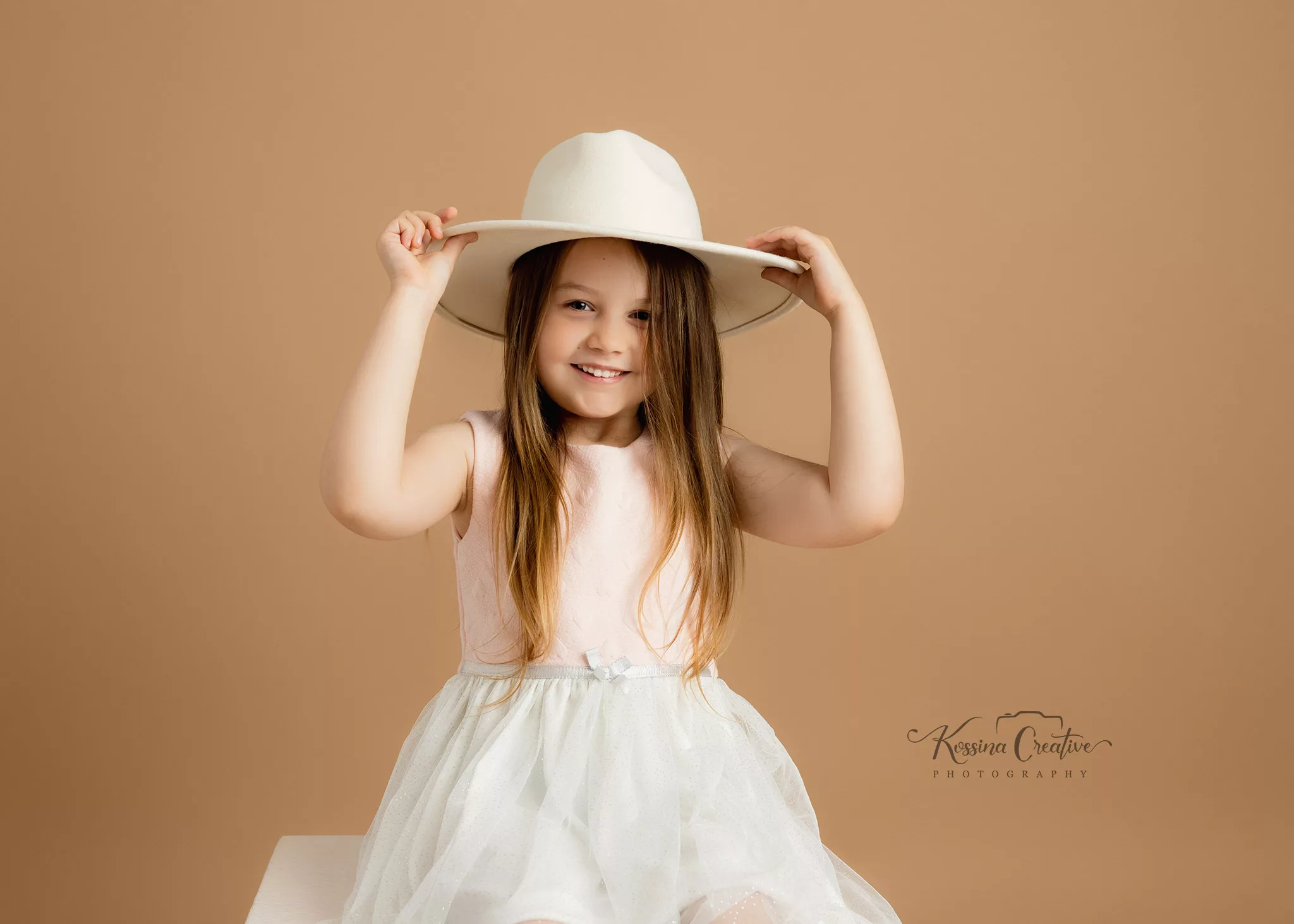 Orlando Family Photographer Birthday Photoshoot little girl with dress and hat
