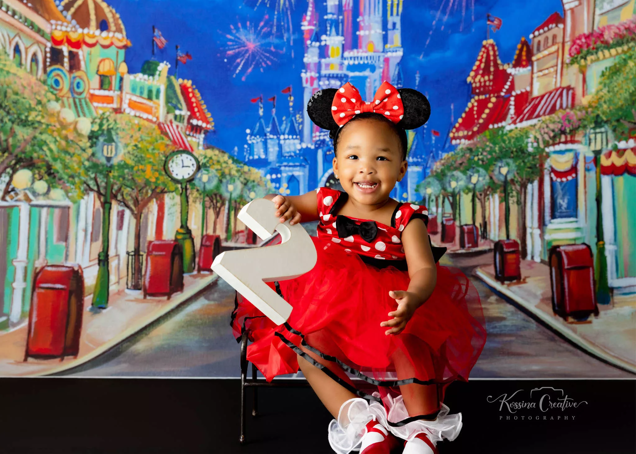 Orlando Family Photographer Birthday Photoshoot second birthday disney mainstreet cinderella castle
