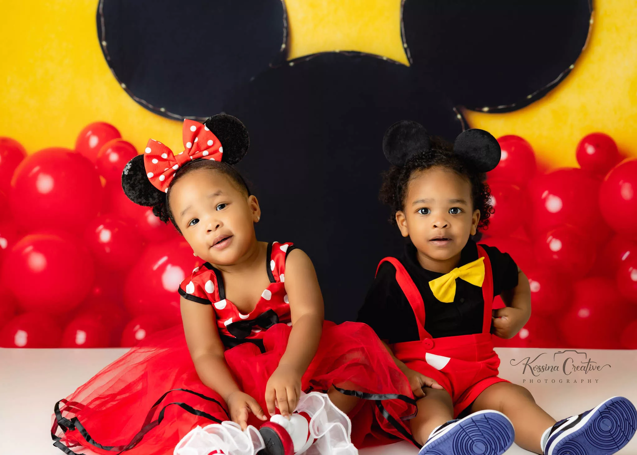 Orlando Family Photographer Birthday Photoshoot boy girl twins 2nd birthday mickey mouse disney world red yellow white