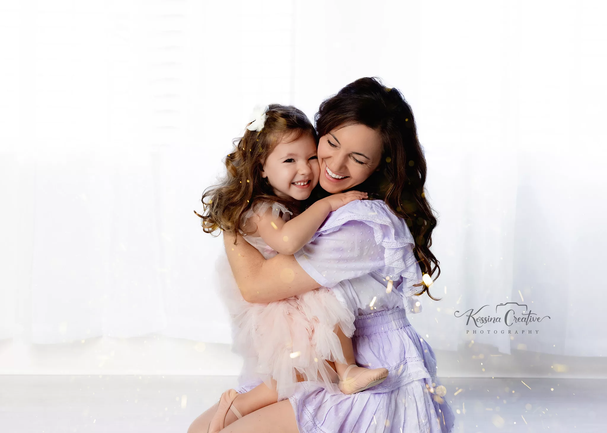 Orlando Family Photographer Birthday Photoshoot mom and daughter hugging