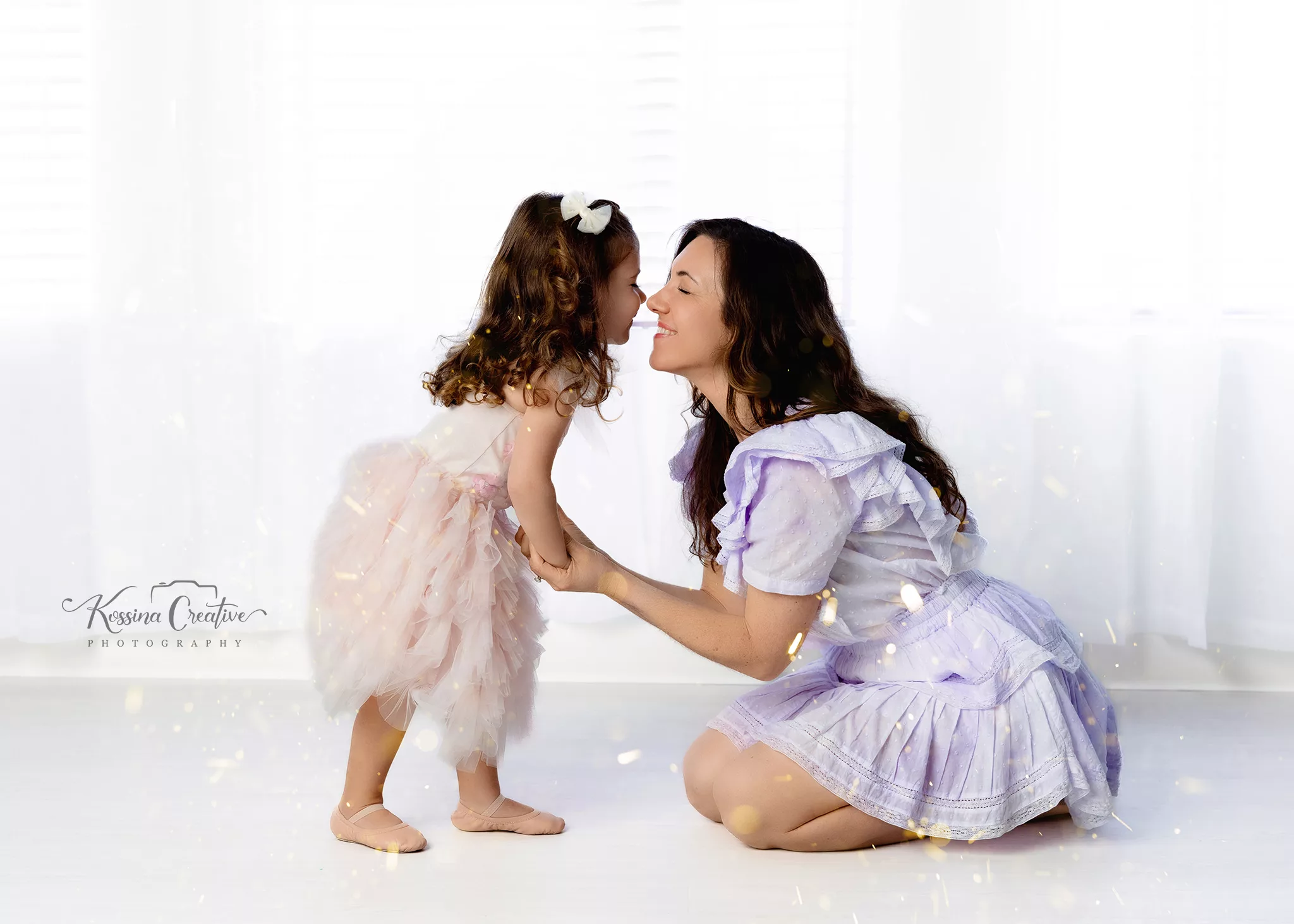 Orlando Family Photographer Birthday Photoshoot nose to nose mom and daughter