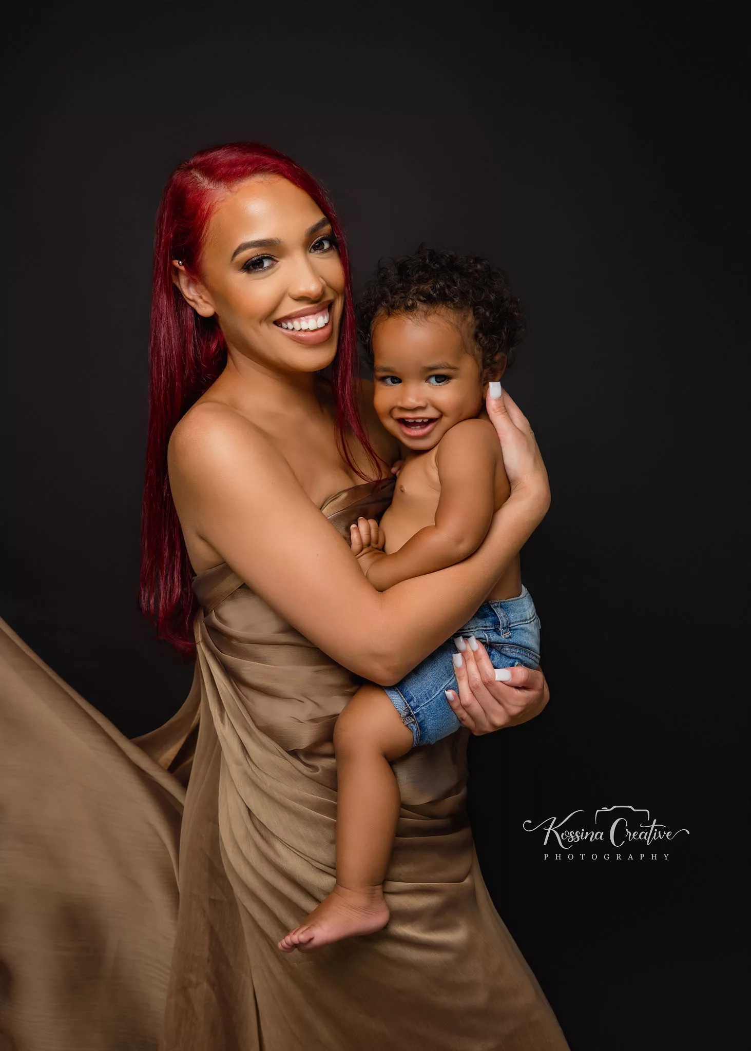 Orlando Family Photographer Motherhood Photo session mommy and me mini session mother and son with black background