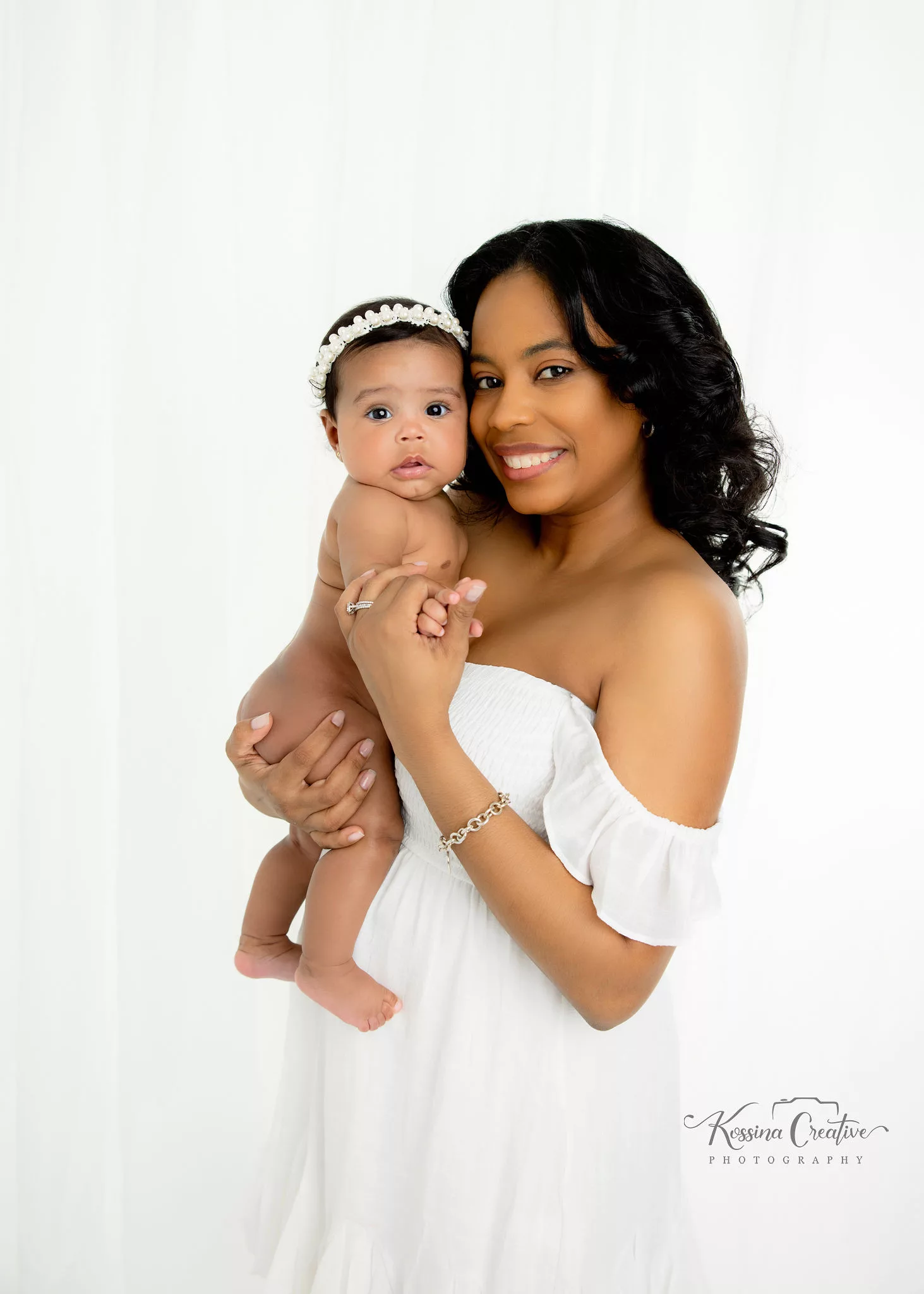 Orlando Family Photographer Motherhood Photo session mommy and me mini session white dress white background mommy and baby girl