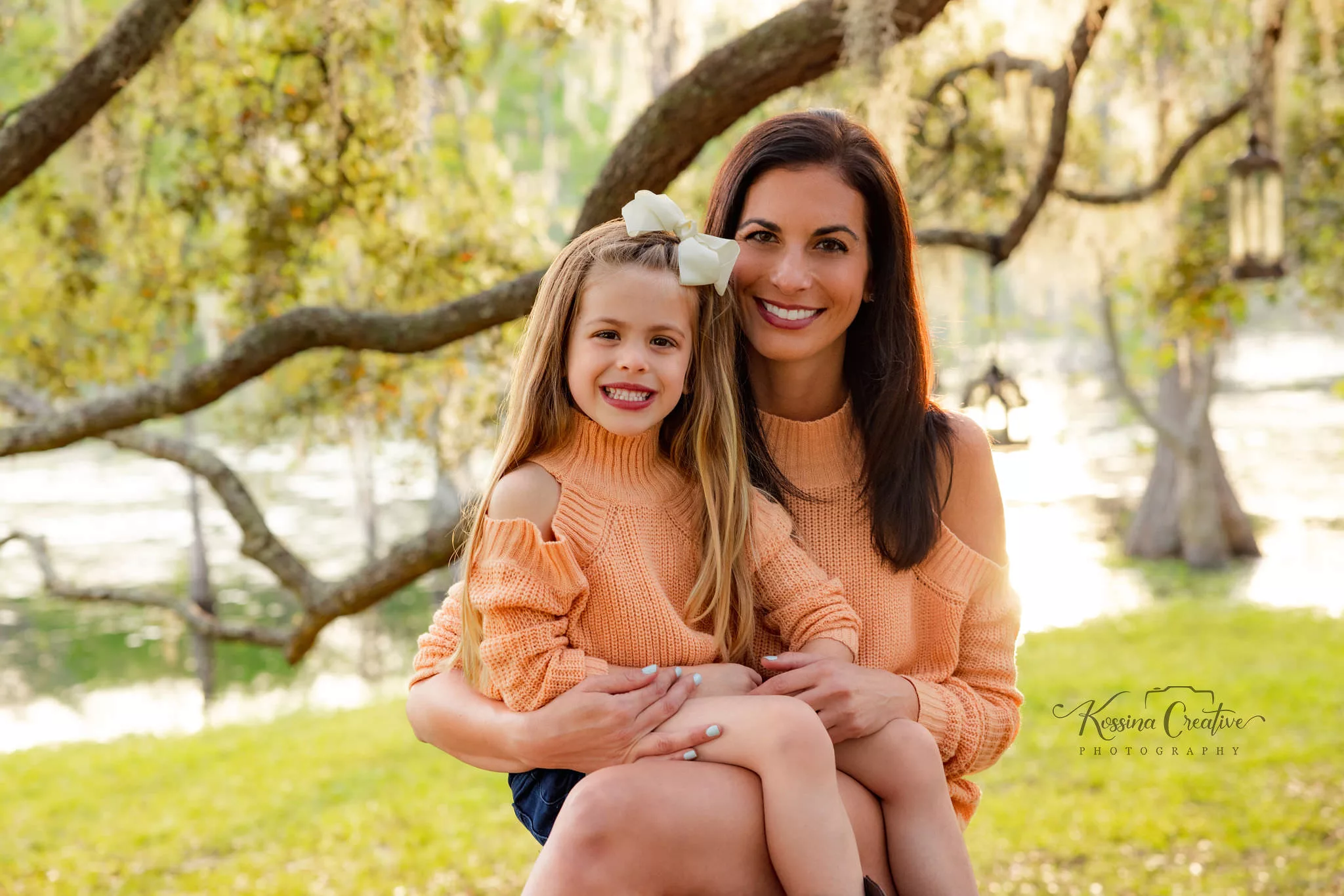 Orlando Family Photographer Motherhood Photo session mommy and me mini session mother and daughter outside matching orange sweaters