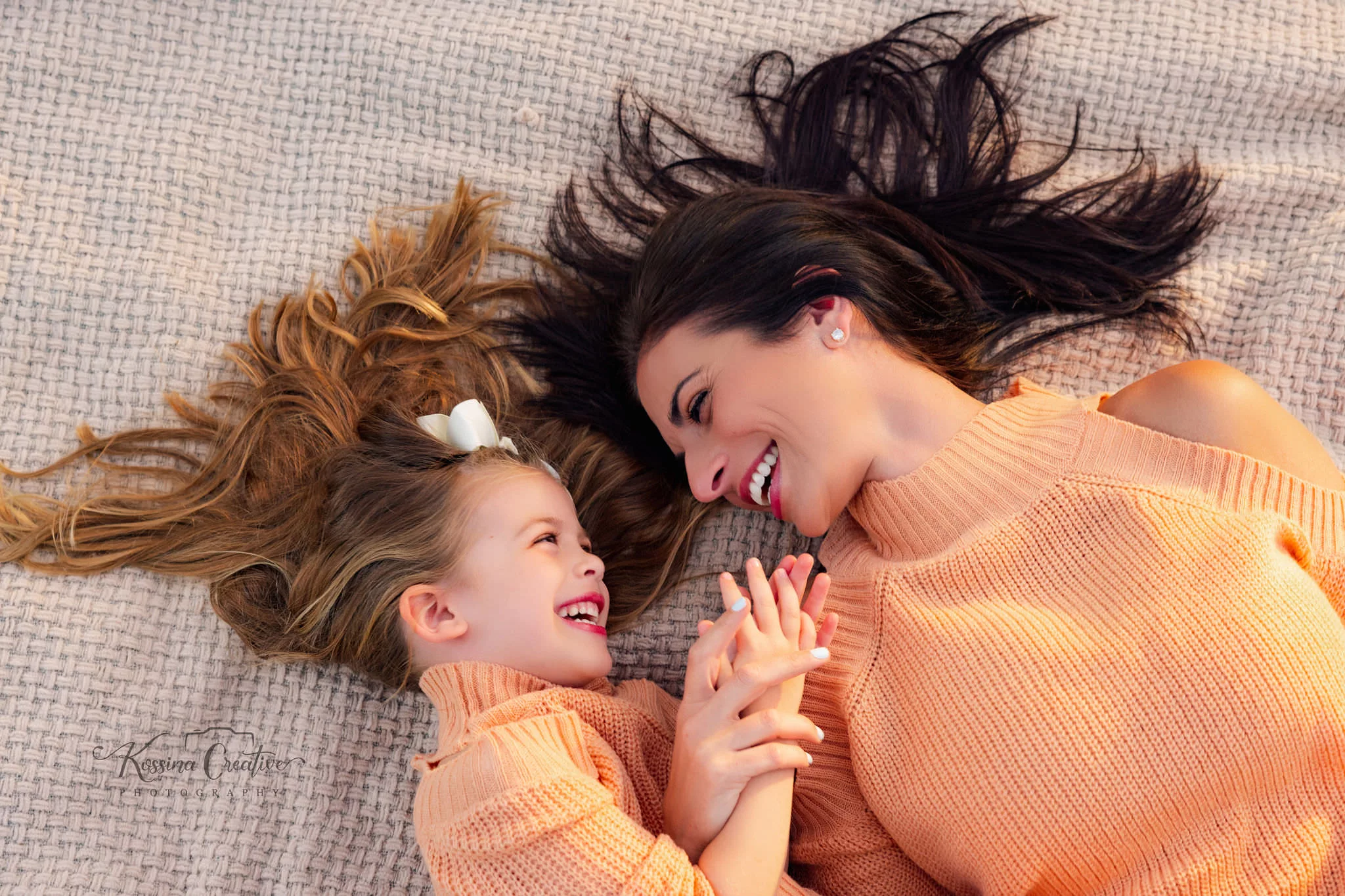Orlando Family Photographer Motherhood Photo session mommy and me mini session mother and daughter laying down smiling