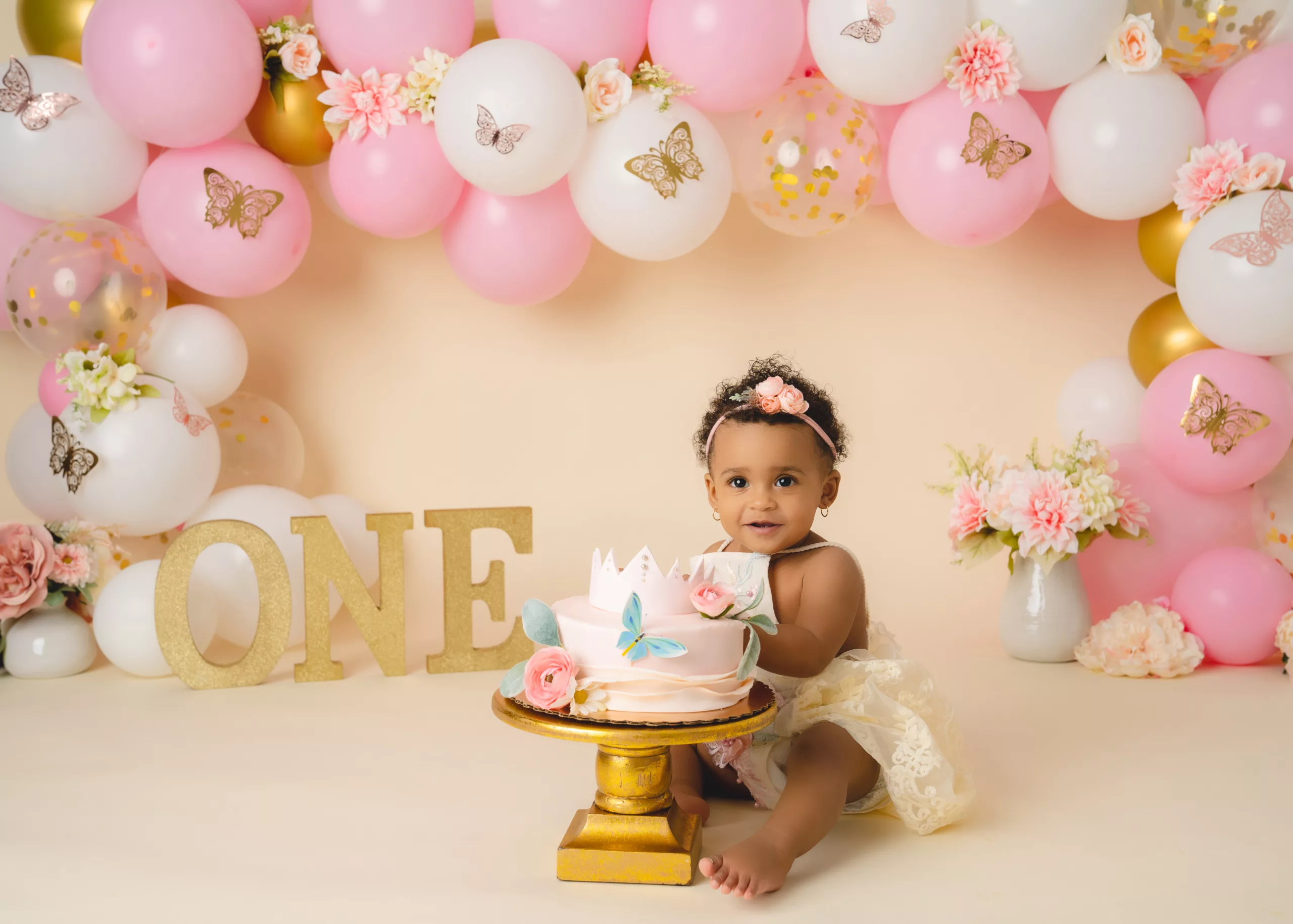 Orlando Girl Cake Smash 1st Birthday Photographer Photo Studio pink white balloon garland with butterflys one letters