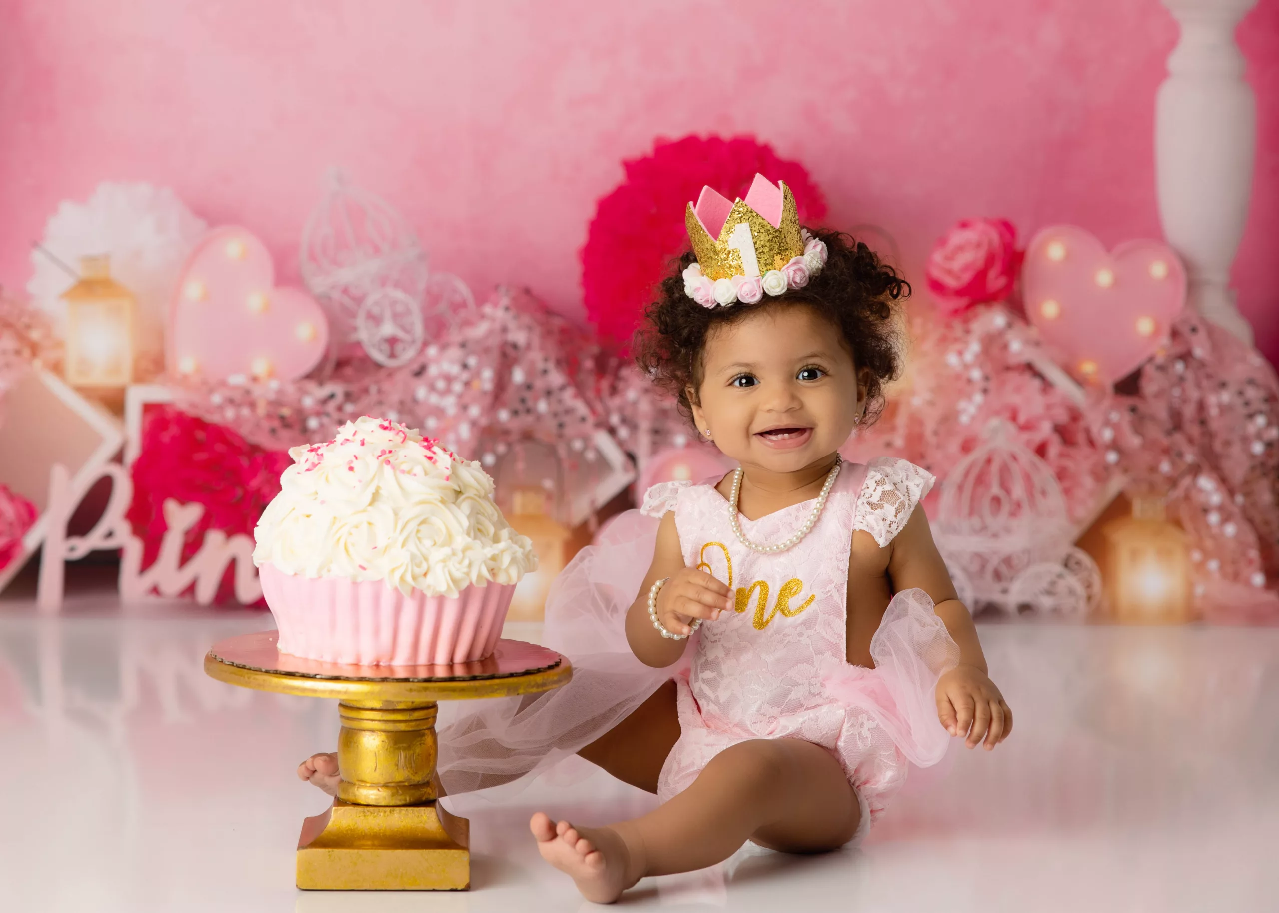 Orlando Girl Cake Smash 1st Birthday Photographer Photo Studio cupcake cake princess back ground dark pink light pink crown