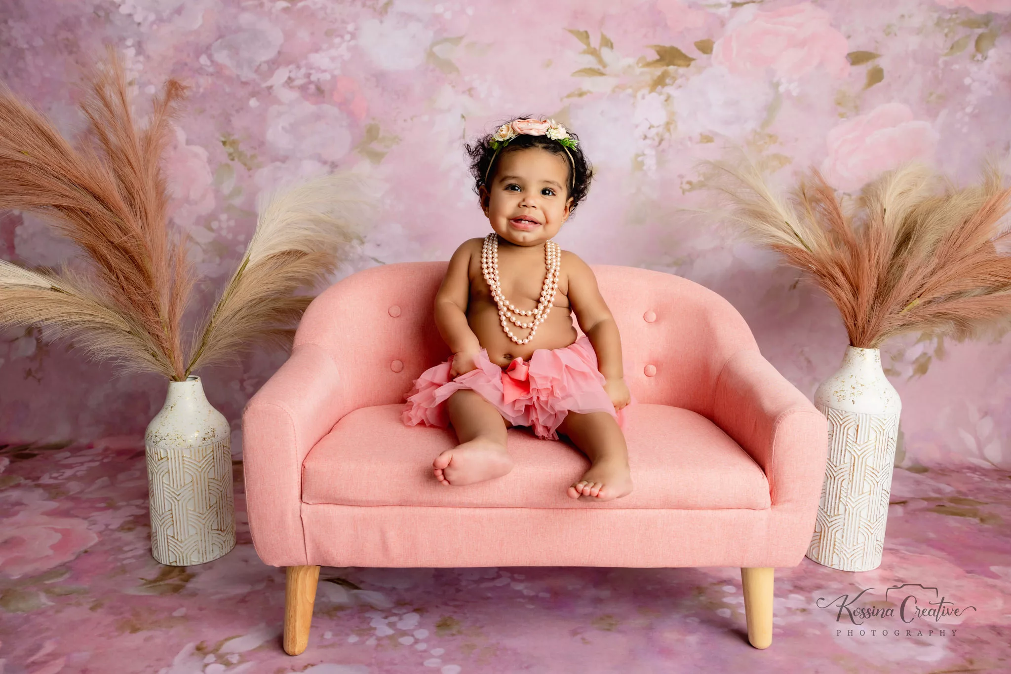 Orlando Girl Cake Smash 1st Birthday Photographer Photo Studio pink background pink couch pink tutu pearls