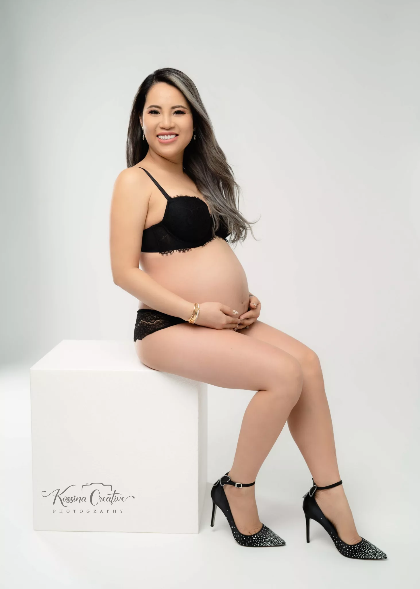 Orlando Maternity Boudoir Photographer Photo Studio Glamour shots white back ground black heels