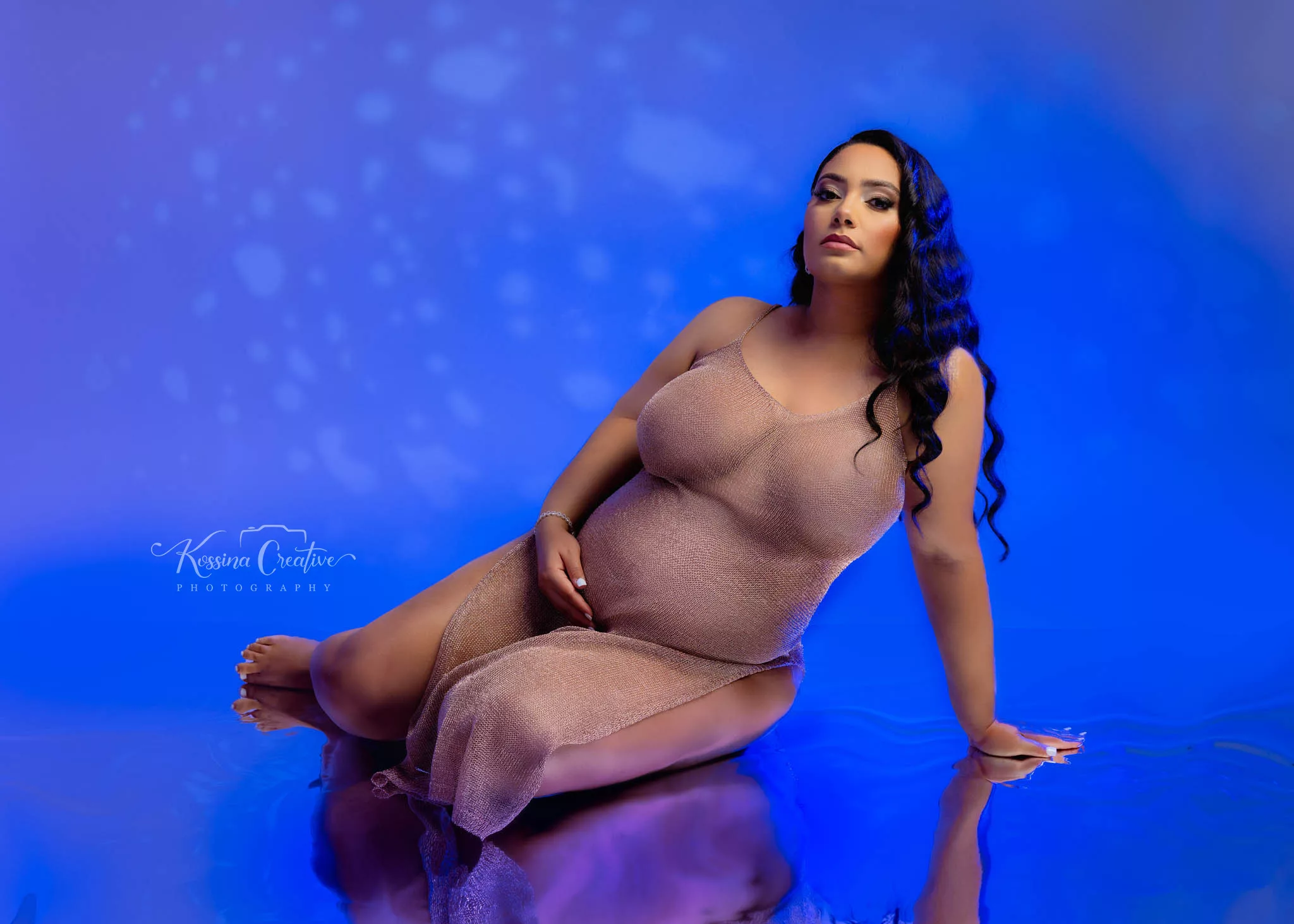 Orlando Maternity Boudoir Photographer Photo Studio Glamour shots blue reflective floor with dress