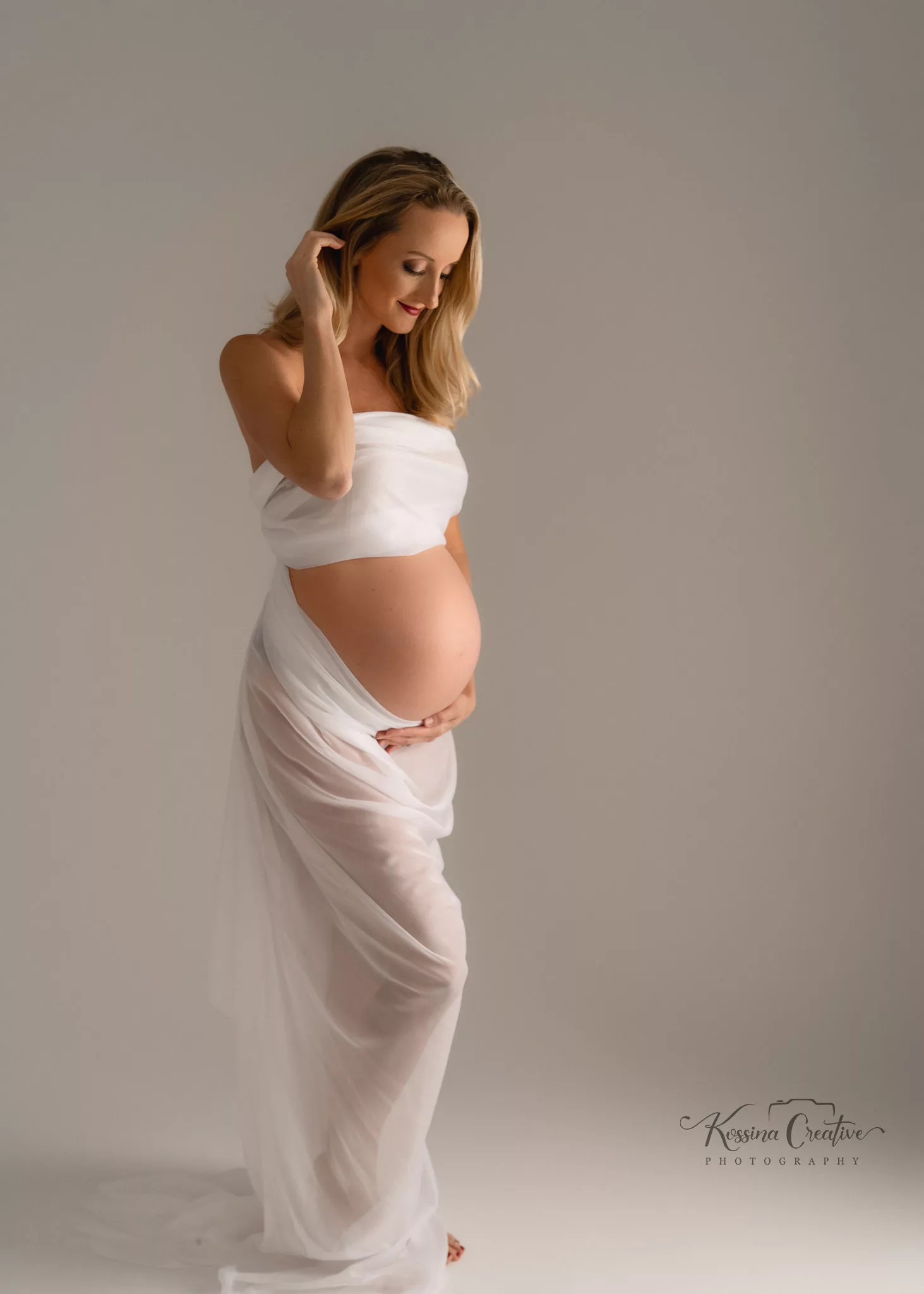 Orlando Maternity Boudoir Photographer Photo Studio Glamour shots white wrap
