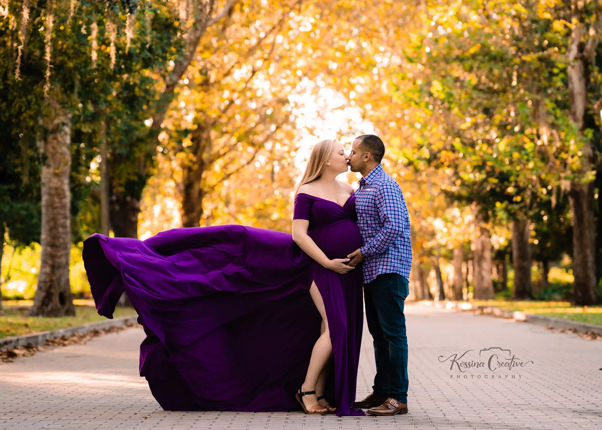 Orlando Maternity Photographer Pregnancy photography meadgardens winter park purple flowy dress with couple