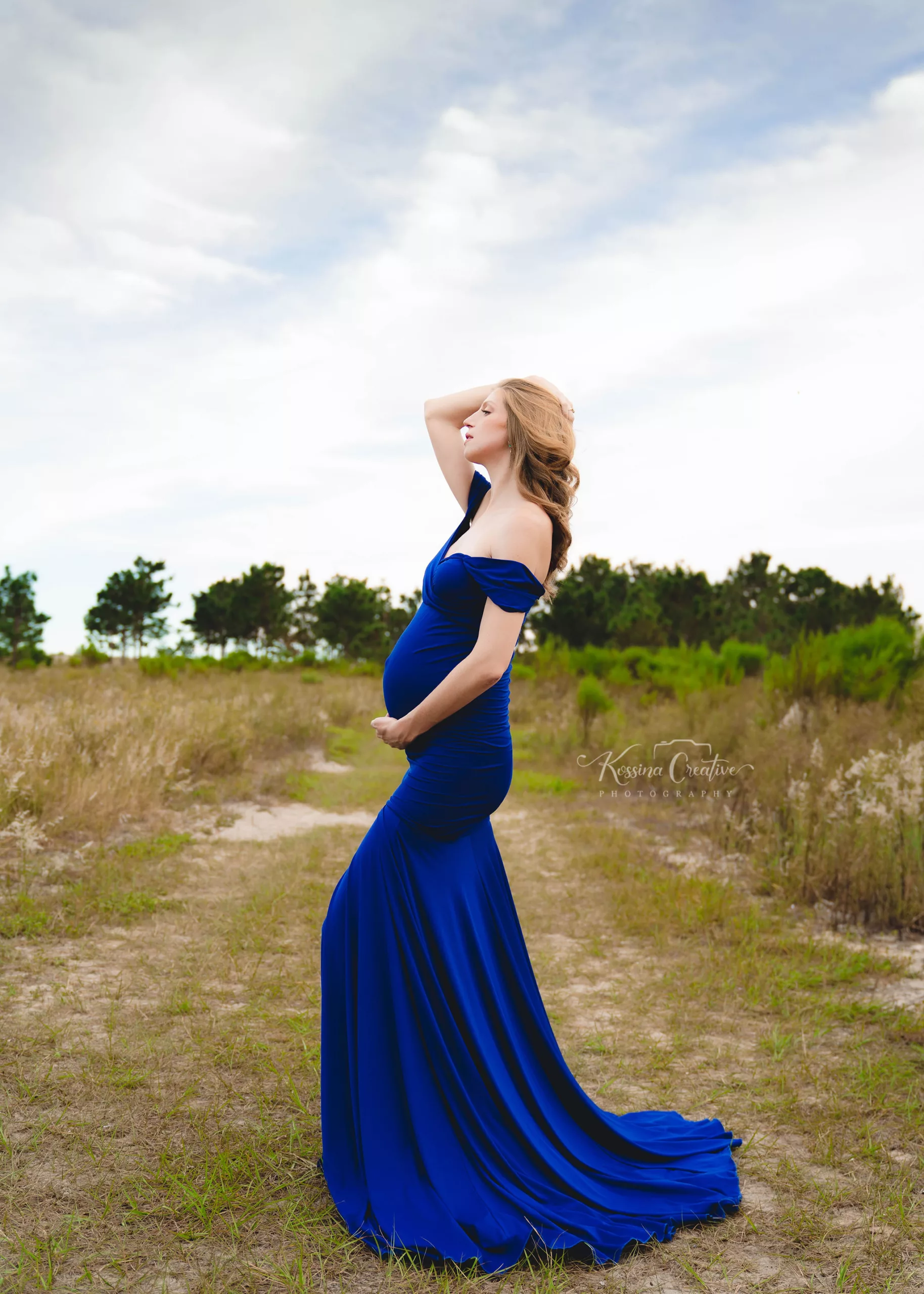 Orlando Maternity Photographer Pregnancy photography lake louisa background with blue dress