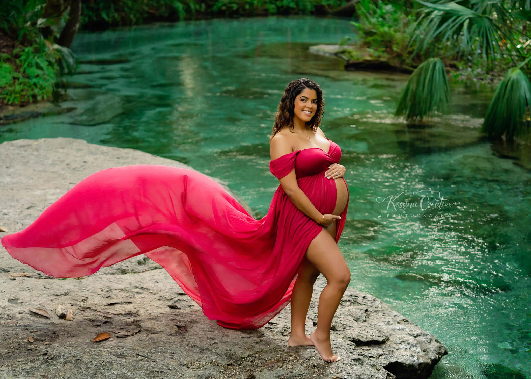 Orlando Maternity Photographer Pregnancy photography rock springs outdoor with red flowy dress