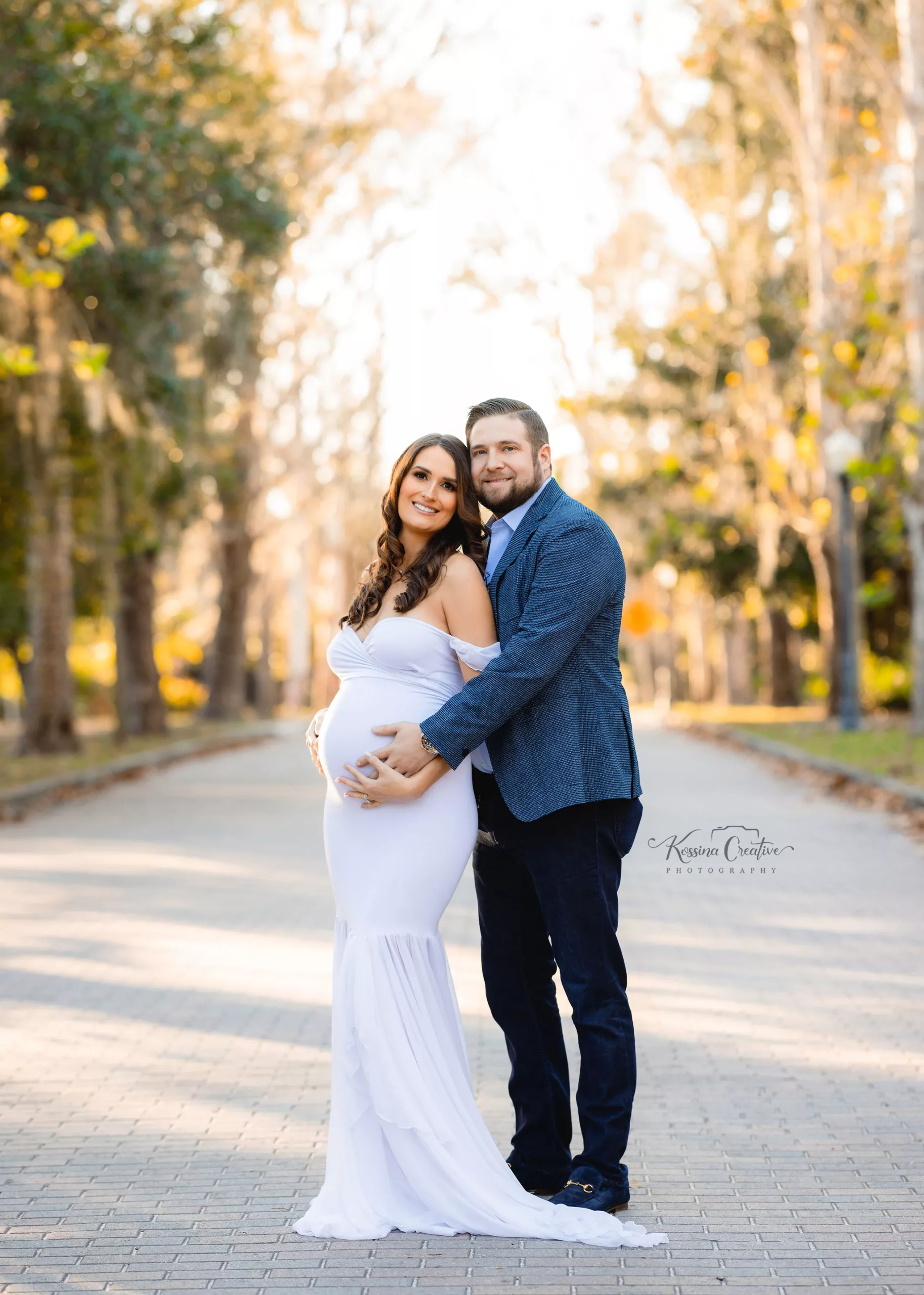 Orlando Maternity Photographer Pregnancy photography mead gardens winter park couple session with white dress