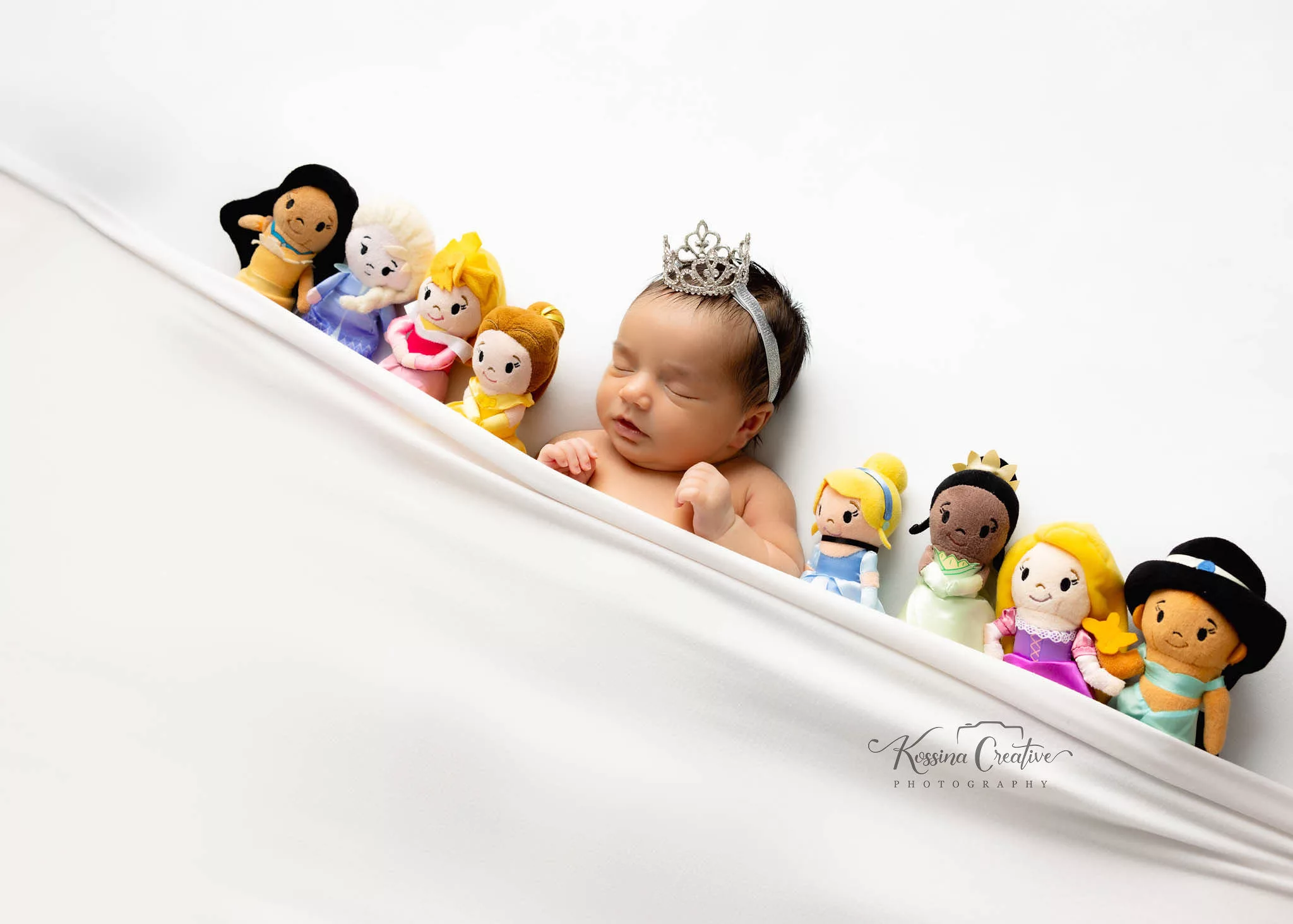 Orlando Newborn Photographer Baby Girl Photo studio disney princesses jasmine rapunzel tiana cinderella belle sleeping beauty pochahantus white one white princess crown