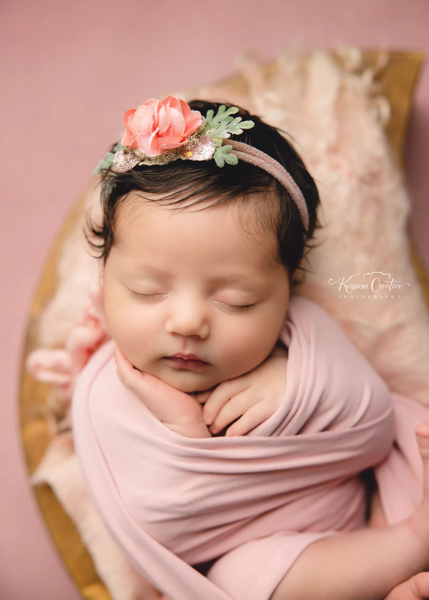 Orlando Newborn Photographer Baby Girl Photo studio pink wrap in baby bowl with pick flower headband