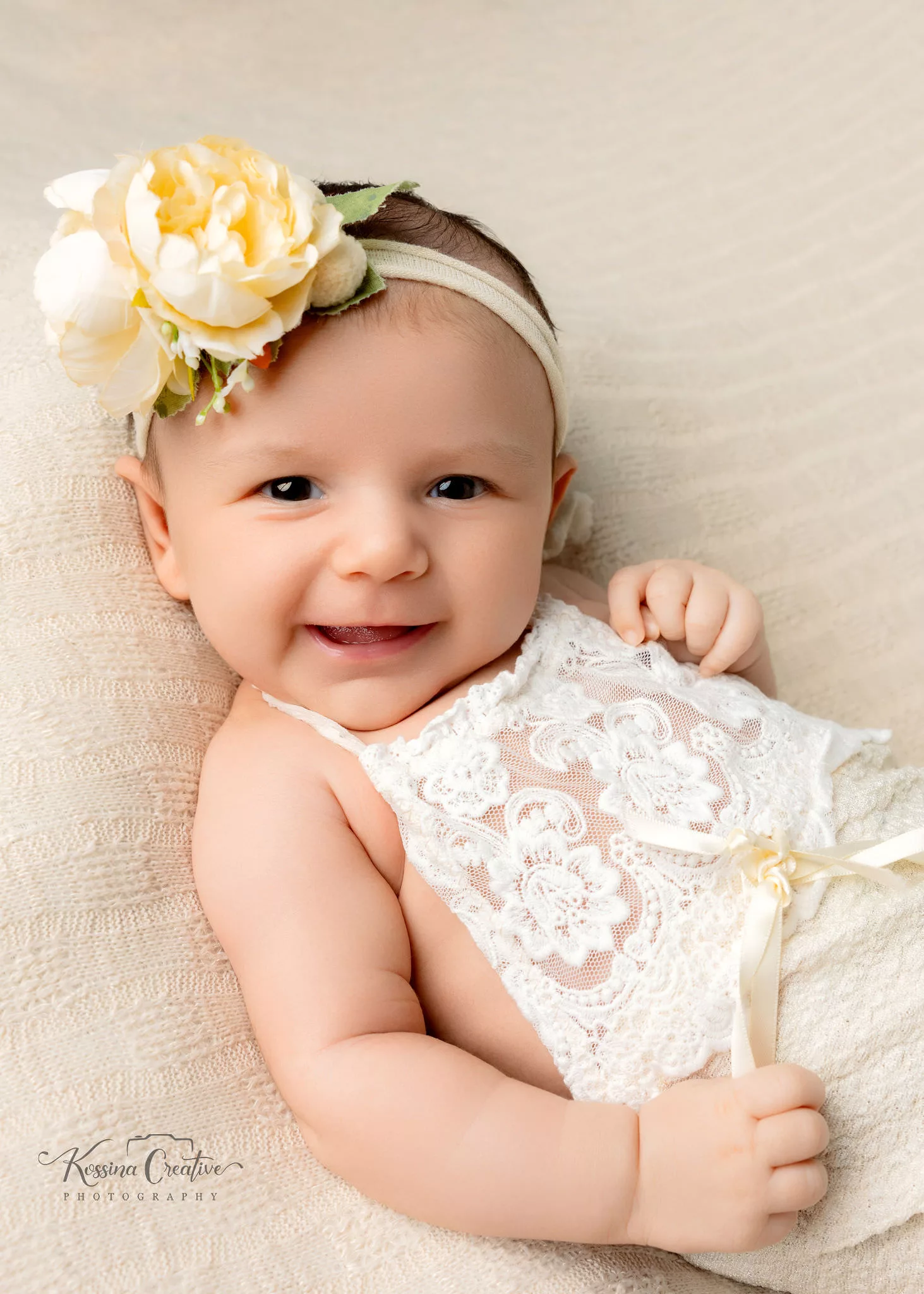Orlando Newborn Photographer Baby Girl Photo studio cream week old baby