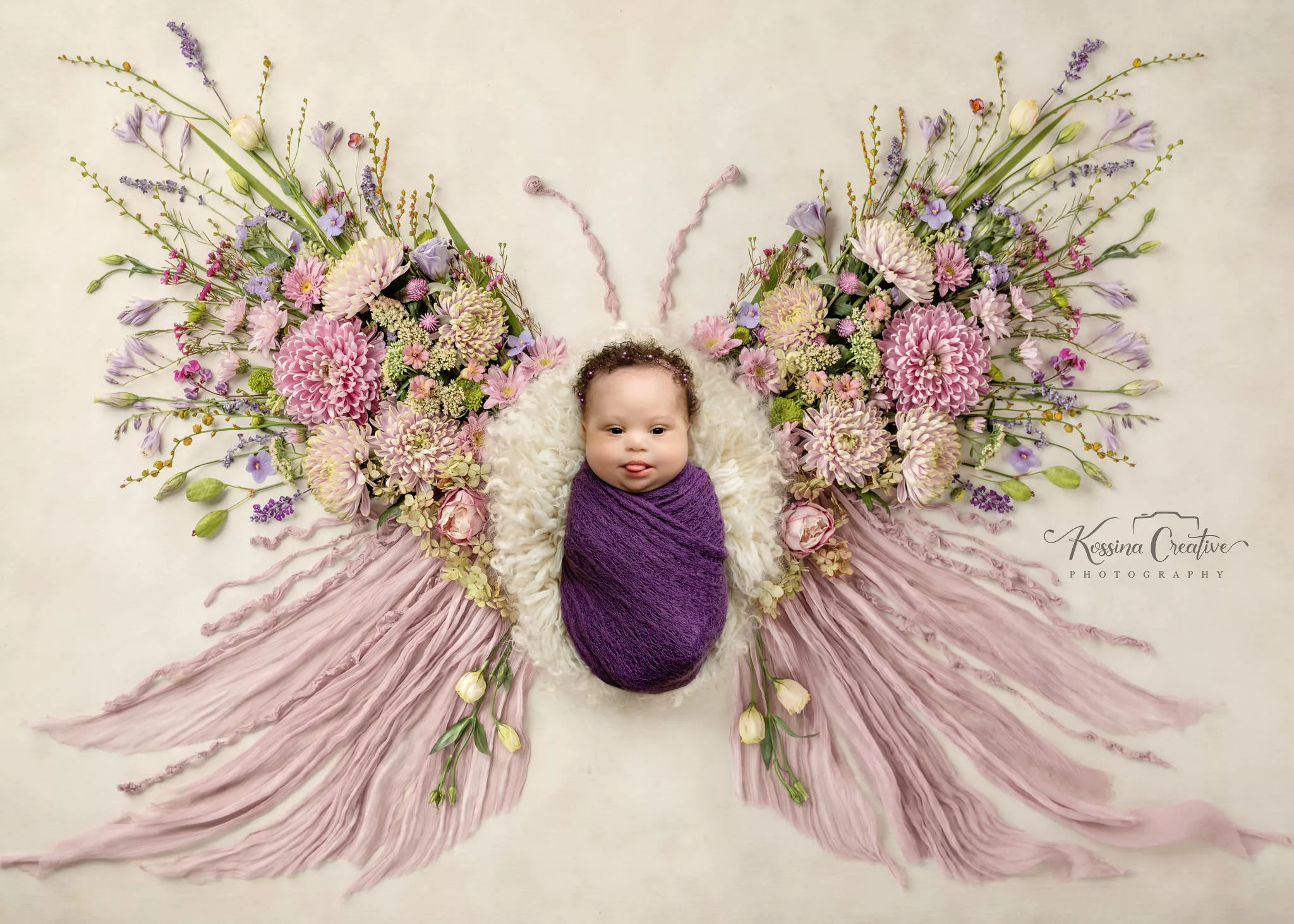 Orlando Newborn Photographer Baby Girl Photo studio purple pink butterfly flower cutie