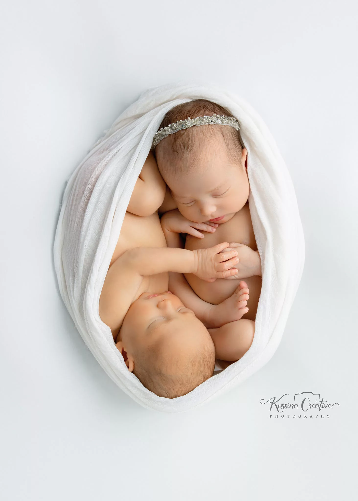 Orlando Newborn Photographer Baby Girl Photo studio boy girl twins white on white