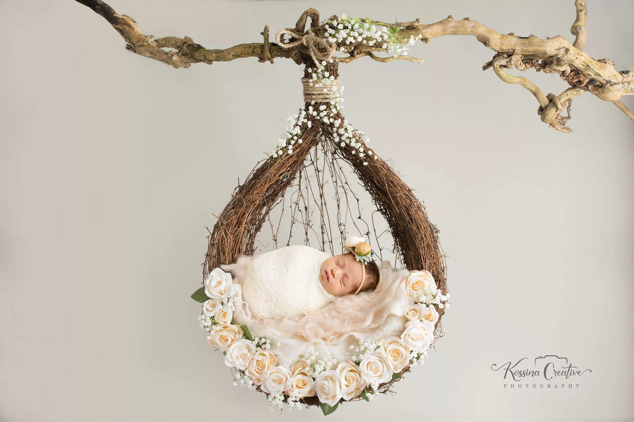 Orlando Newborn Photographer Baby Photo studio cream hanging floral baby