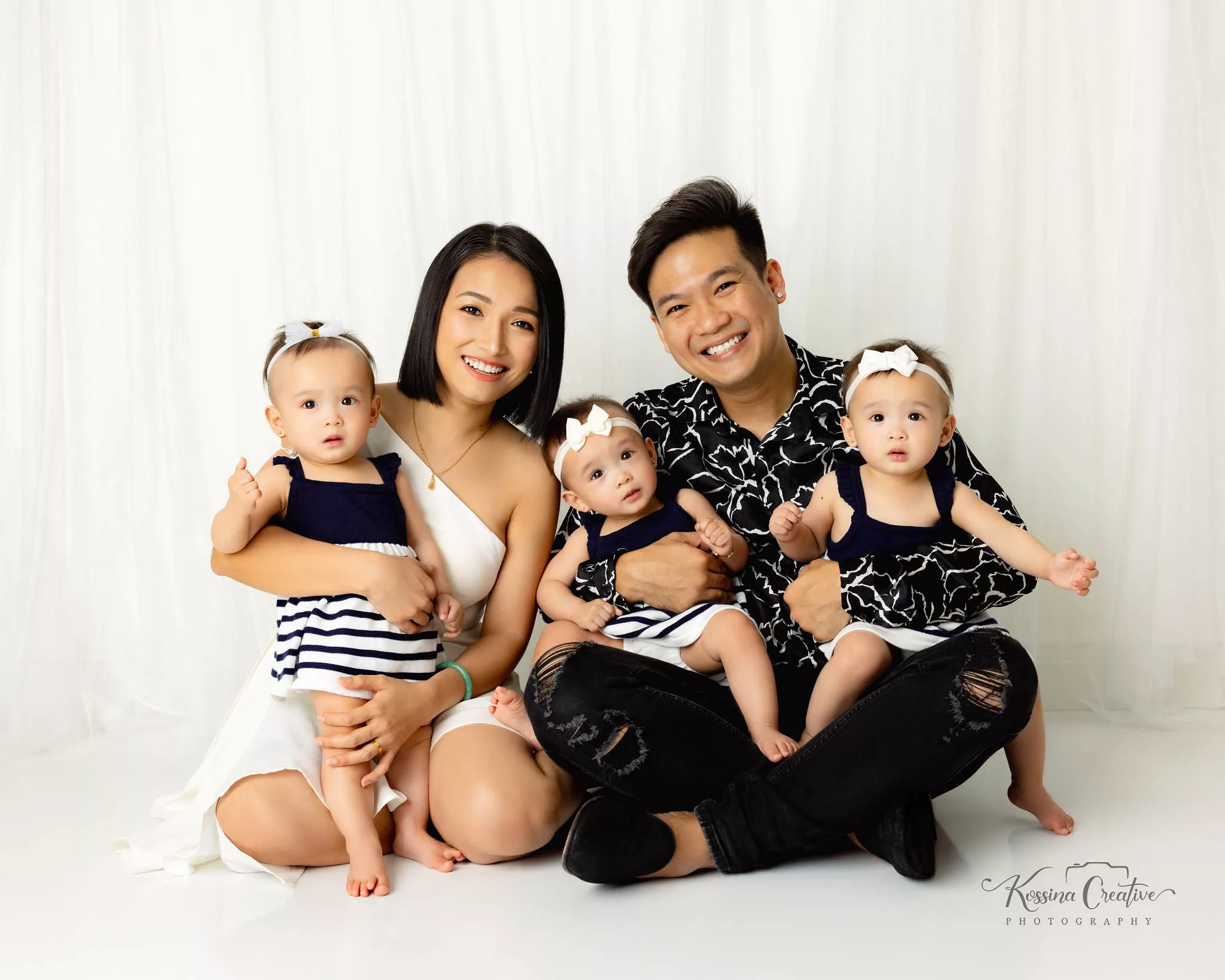 orlando photo studio family photographer studio portraits generations triplets mom and dad white and black