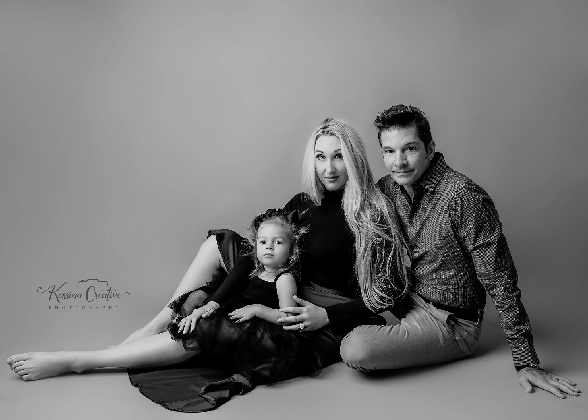 orlando photo studio family photographer studio portraits generations black and white family of three